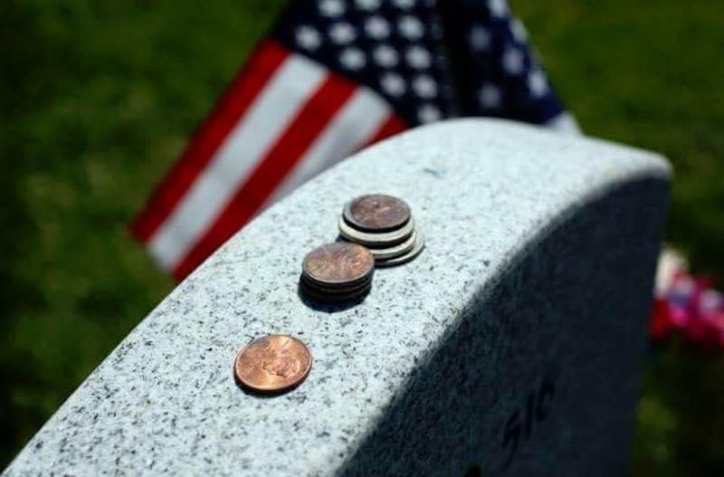 Why Are Coins Left on Gravestones in Cemeteries?