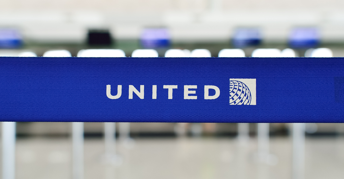 United logo on barrier ribbon in airport