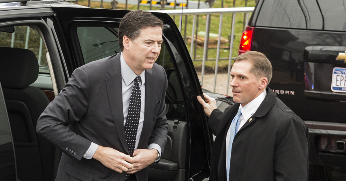 James Comey stepping out of a vehicle
