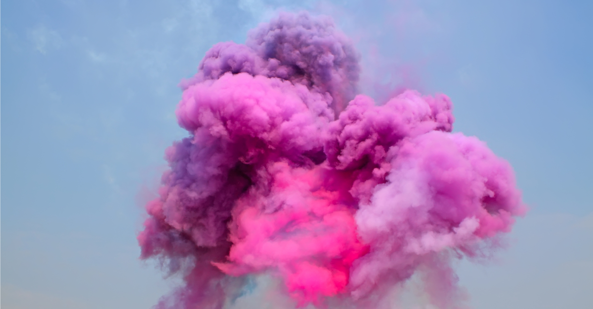 Pink and purple smoke in the sky.