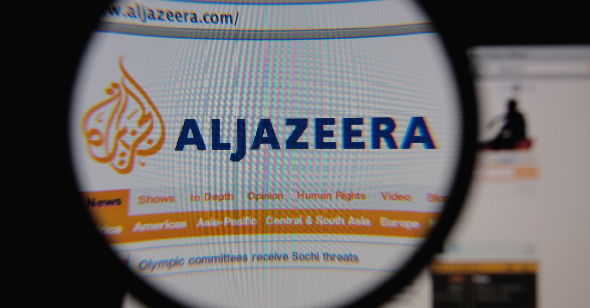 Al Jazeera web site under a magnifying glass