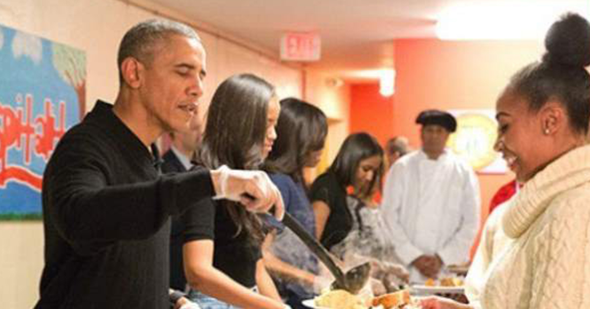 President Barack Obama serves food to homeless veterans for Thanksgiving in Washington, D.C., November 2015.