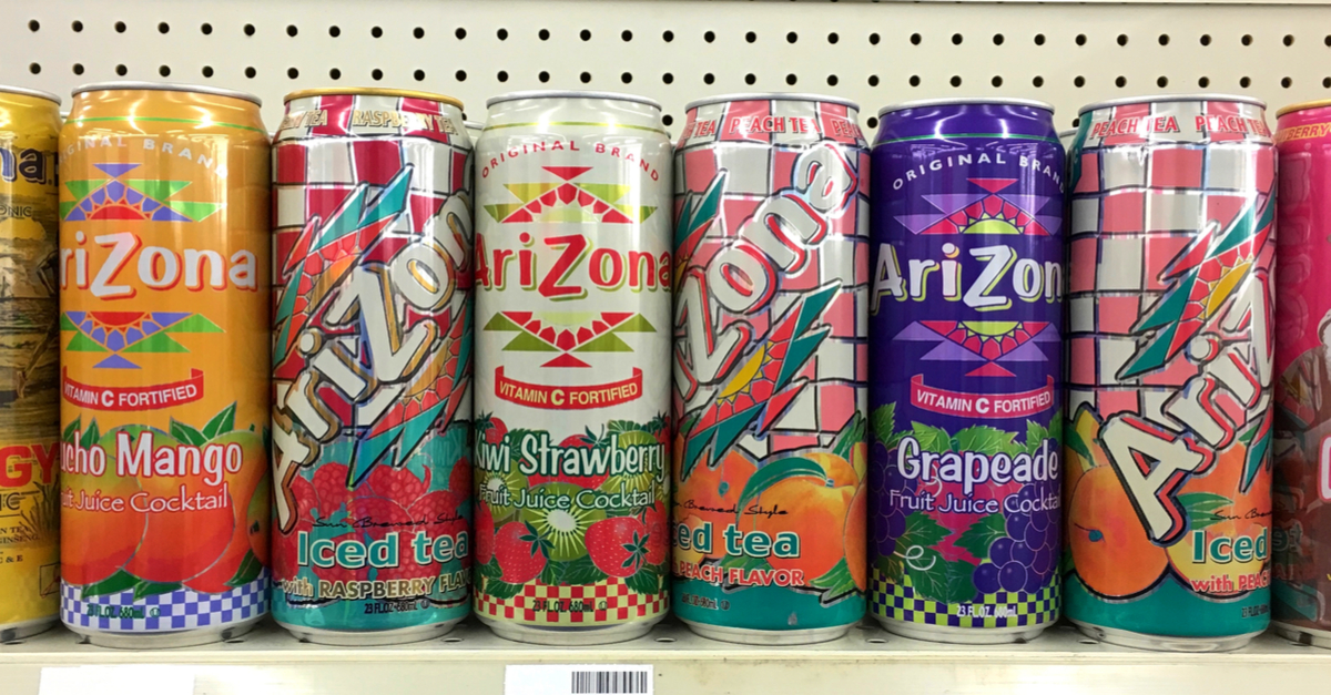 Cans of Arizona brand tea on shelf