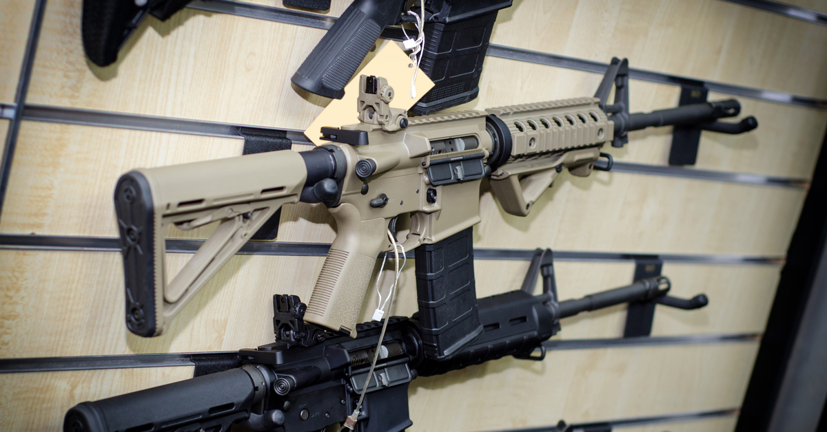 AR-15 rifles on a shelf.