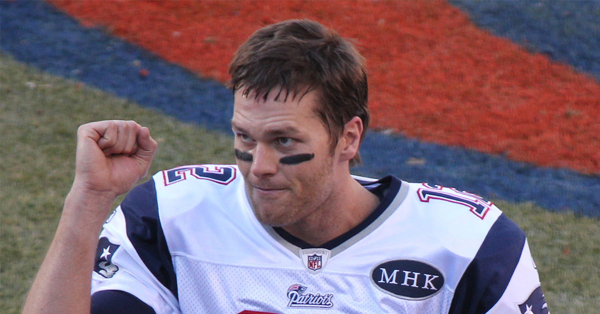Tom Brady on a football field.