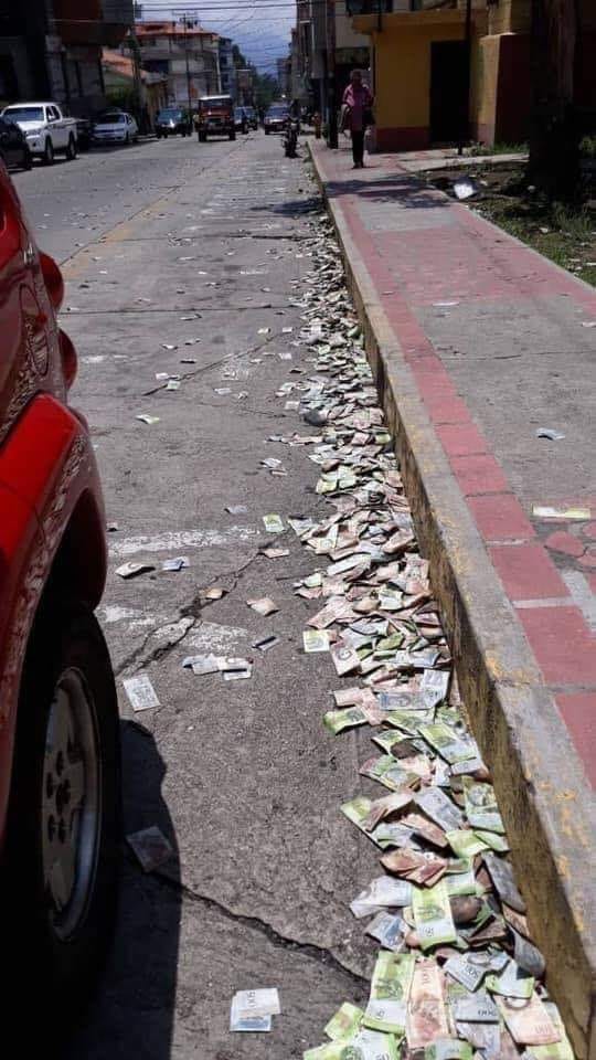 Is This A Photograph Of Worthless Money In The Gutters Of Venezuela