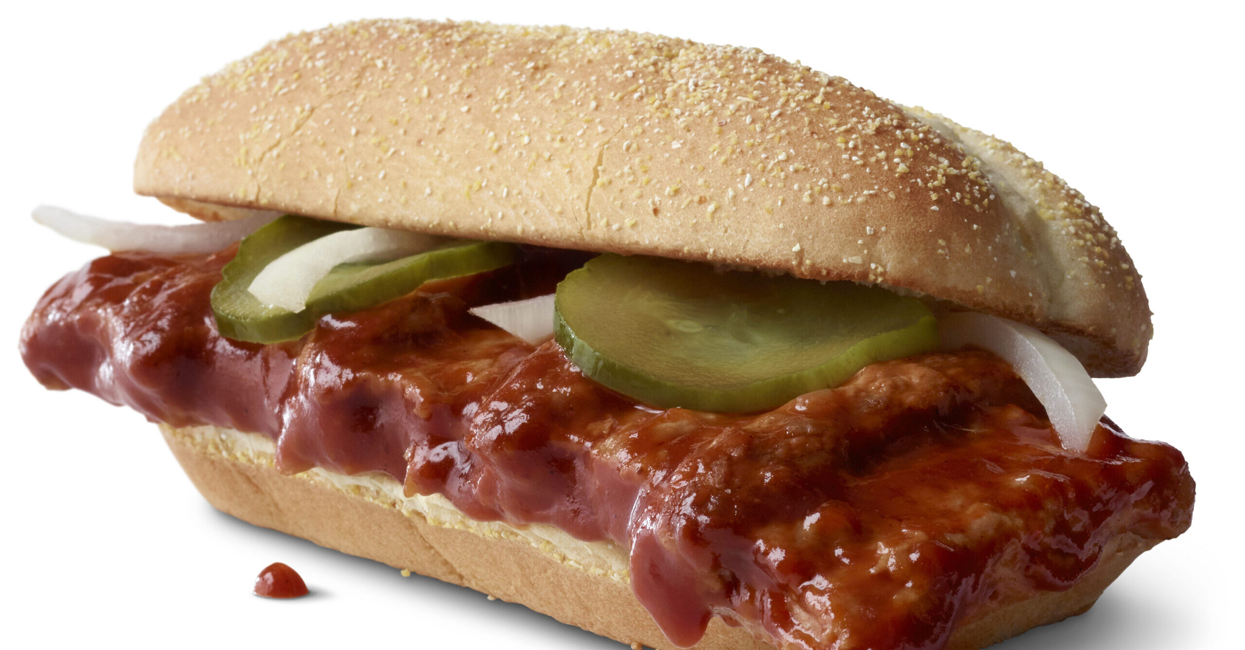 This photo provided by McDonald's shows the McRib sandwich. McDonald’s announced that it was bringing its barbeque slathered sandwich with the cult following back for yet another run on Dec. 2. The fast-food giant said the sandwich would be available nationally for the first time since 2012, but only at participating restaurants for a limited time. (McDonald's via AP)