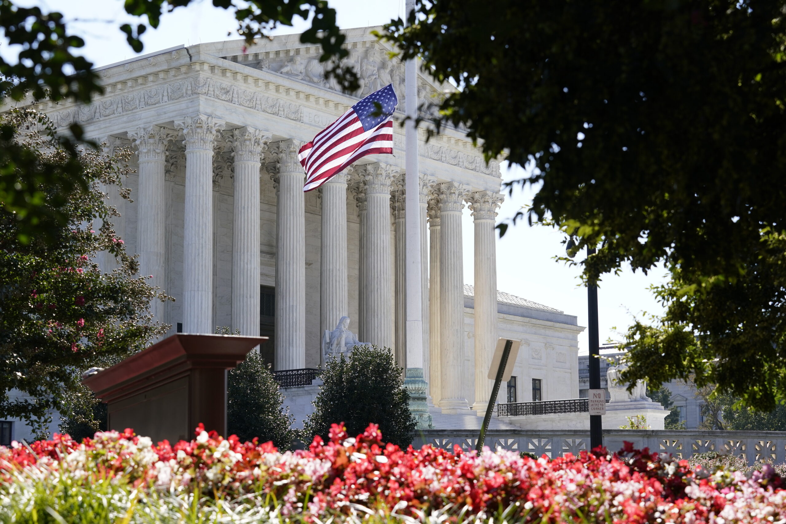 The Supreme Court is seen in Washington, Tuesday, Oct. 6, 2020, as the justices continue arguments in a new term without their colleague, the late Justice Ruth Bader Ginsburg. (AP Photo/J. Scott Applewhite)