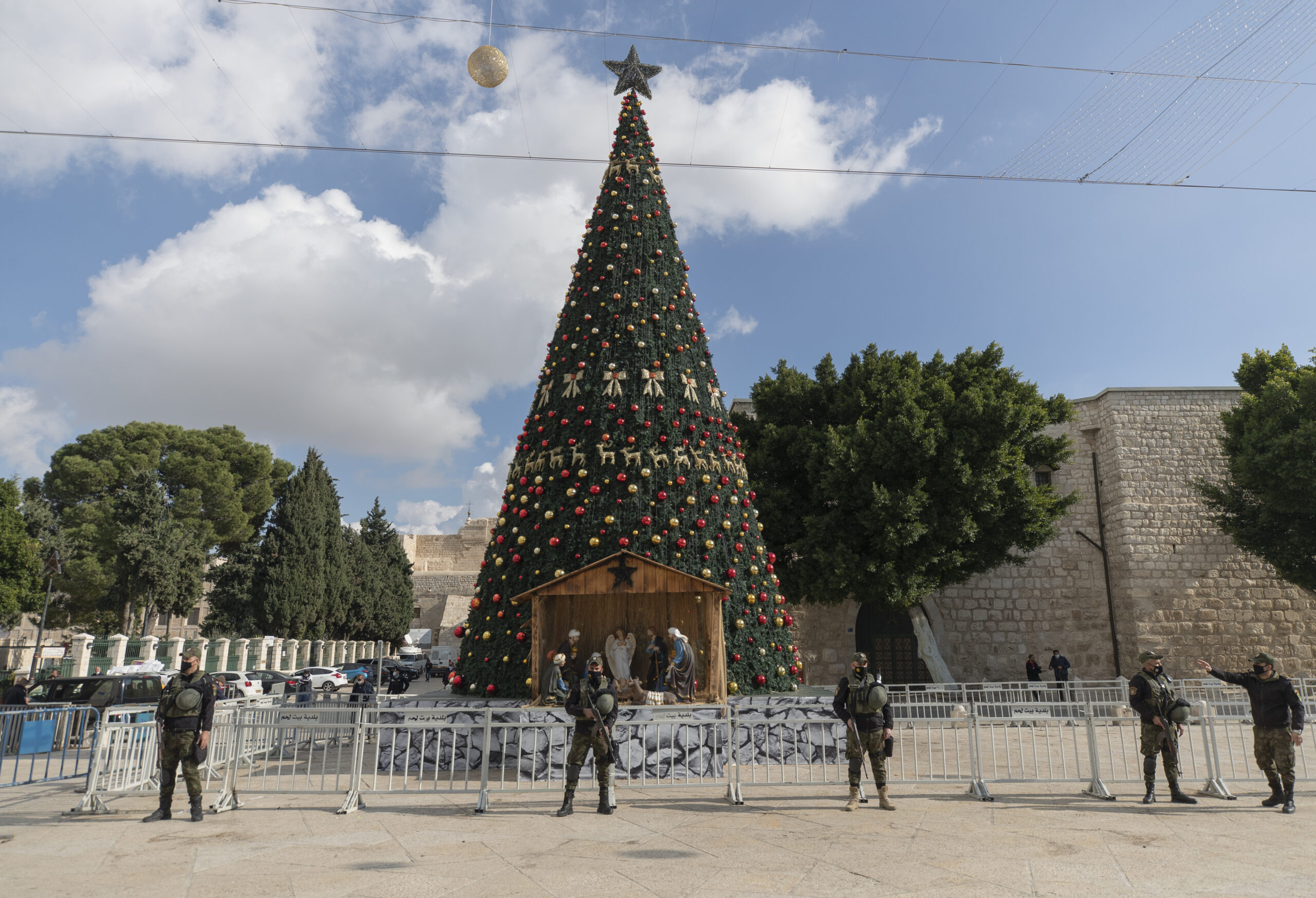 A Palestinian National security unit is deployed in Manger Square, adjacent to the Church of the Nativity, traditionally believed by Christians to be the birthplace of Jesus Christ, ahead of Christmas, in the West Bank city of Bethlehem, Wednesday, Dec. 23, 2020. (AP Photo/Nasser Nasser)