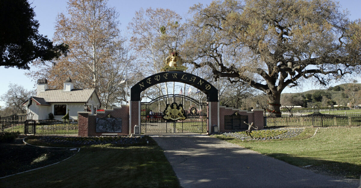 FILE - This Dec. 17, 2004, file photo shows the rear entrance to pop star Michael Jackson's Neverland Ranch home in Santa Ynez, Calif. Jackson’s Neverland Ranch has found a new owner in billionaire businessman Ron Burkle. Burkle’s spokesman said in an email Thursday, Dec. 24, 2020, that Burkle bought the 2,700-acre property near Santa Barbara, California. (AP Photo/Mark J. Terrill, file)