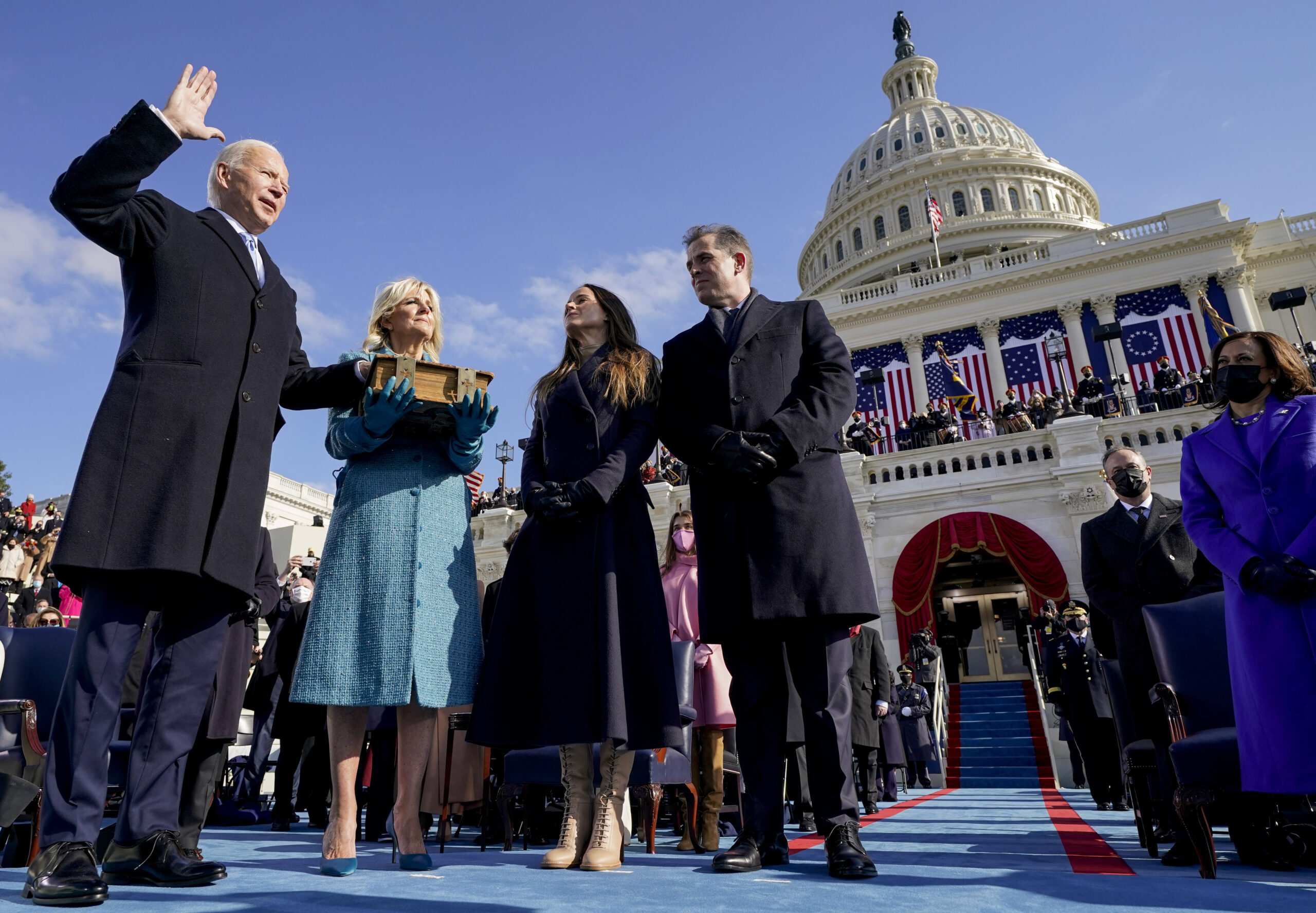 Joe Biden is sworn in as the 46th president of the United States by Chief Justice John Roberts as Jill Biden holds the Bible during the 59th Presidential Inauguration at the U.S. Capitol in Washington, Wednesday, Jan. 20, 2021, as their children Ashley and Hunter watch.(AP Photo/Andrew Harnik, Pool)