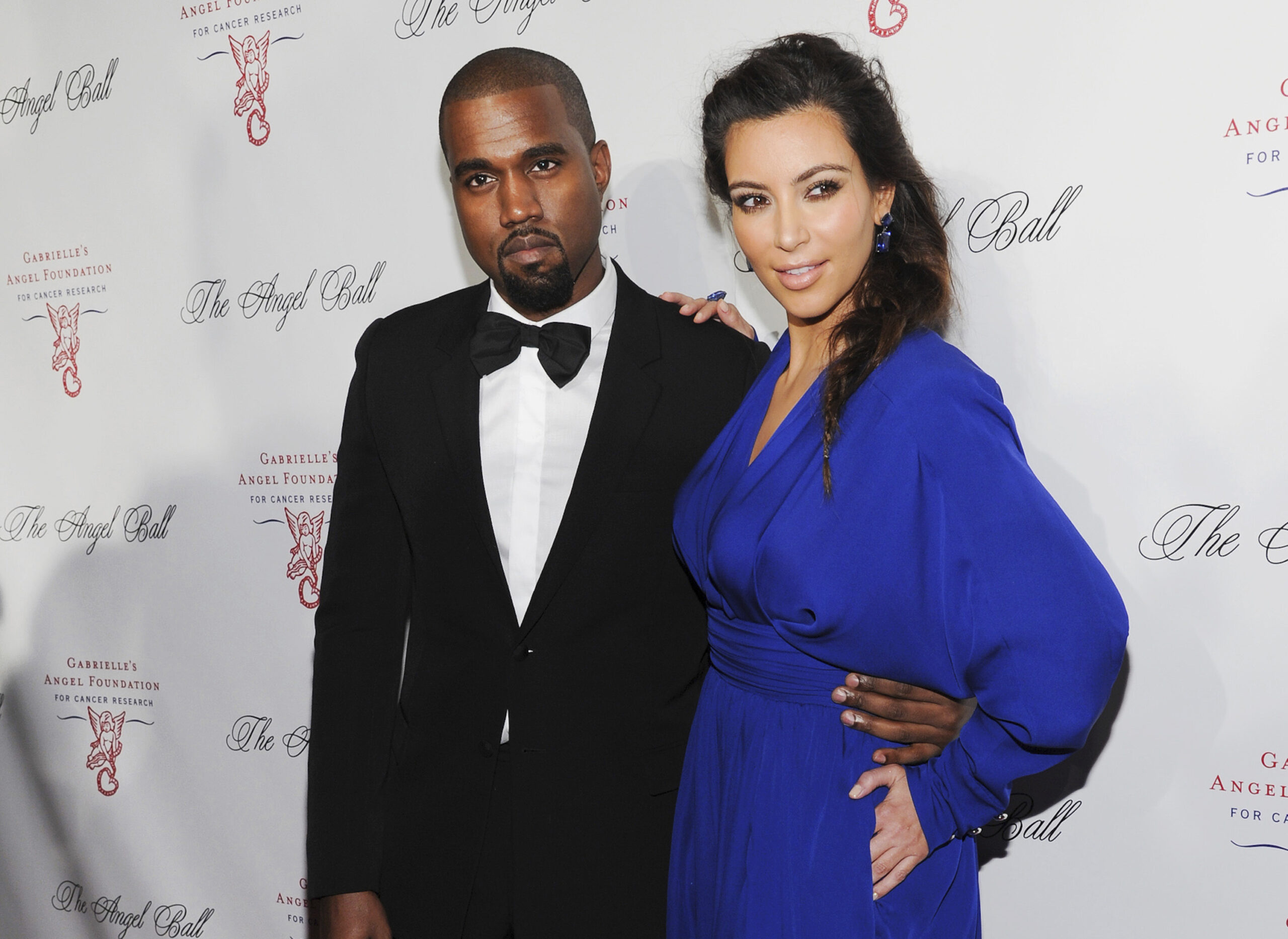 FILE - Kanye West, left, and Kim Kardashian attend Gabrielle's Angel Foundation Angel Ball cancer research benefit on Oct. 22, 2012, in New York. Kim Kardashian West filed for divorce Friday, Feb. 19, 2021, from Kanye West after 6 1/2 years of marriage. Sources familiar with the filing but not authorized to speak publicly confirmed that Kardashian filed for divorce in Los Angeles Superior Court. The filing was not immediately available. (Photo by Evan Agostini/Invision/AP, File