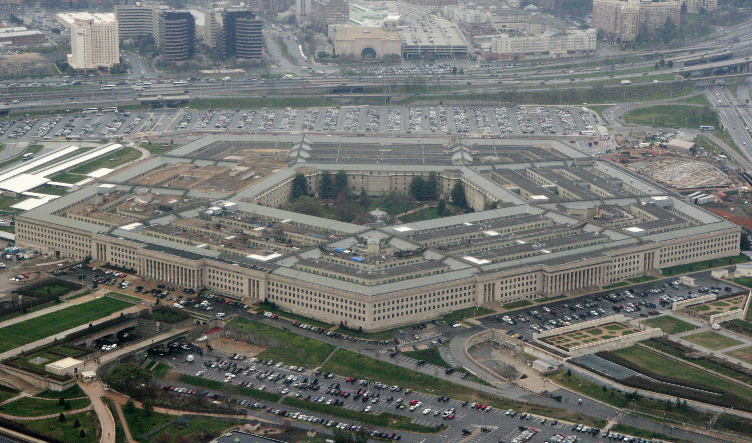 FILE - This March 27, 2008, file photo, shows the Pentagon in Washington. Defense officials say the Pentagon will sweep away Trump-era policies that largely banned transgender people from serving in the military and will issue new rules that broaden their access to medical care and gender transition. (AP Photo/Charles Dharapak, File)