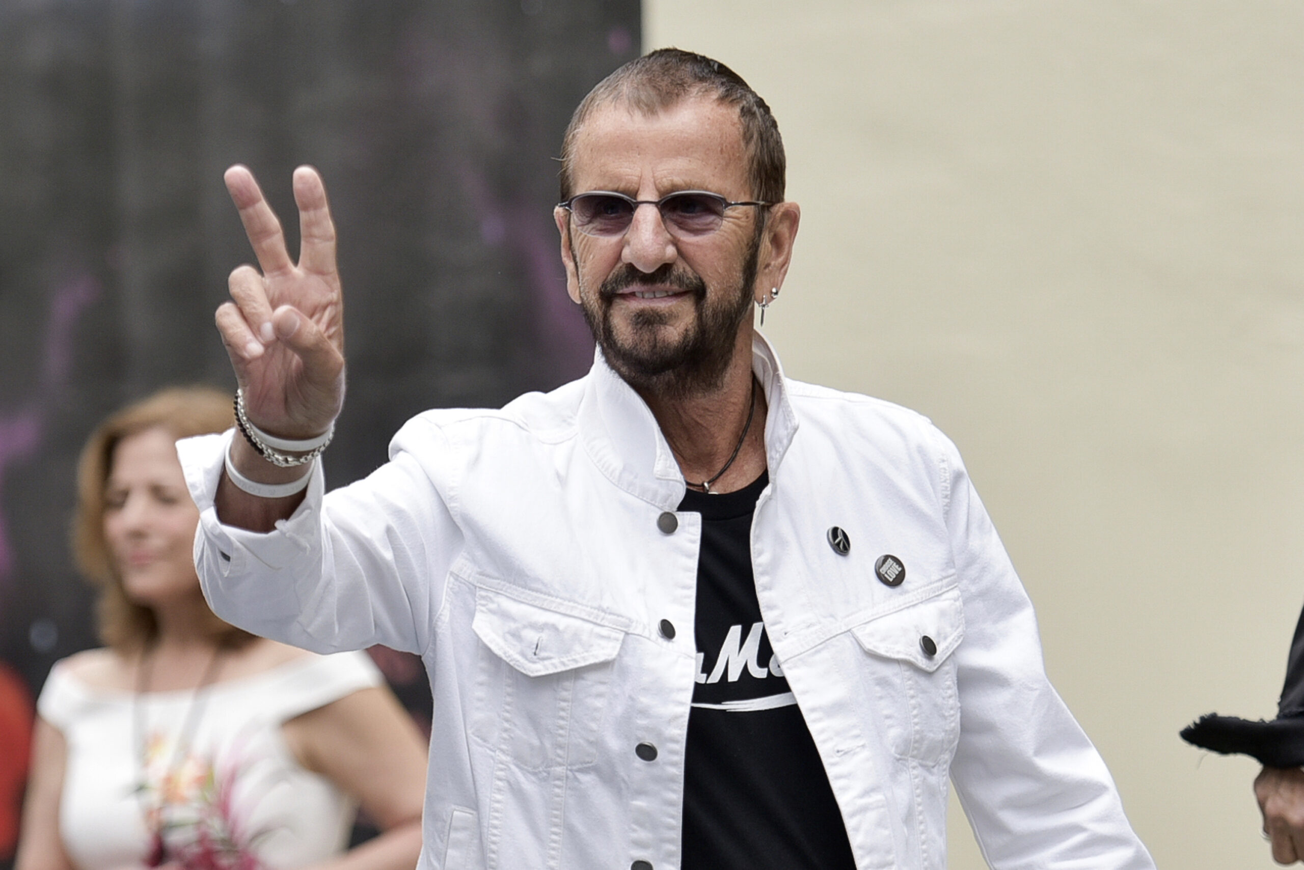 FILE - Ringo Starr attends Ringo's 11th Annual Peace and Love birthday celebration on July 7, 2019, in Los Angeles. A bevy of stars including Paul McCartney, Sheryl Crow, Dave Grohl, Chris Stapleton, Lenny Kravitz and Jenny Lewis are all on the chorus of Starr's most recent song, "Here's to the Nights." (Photo by Richard Shotwell/Invision/AP, FILE)