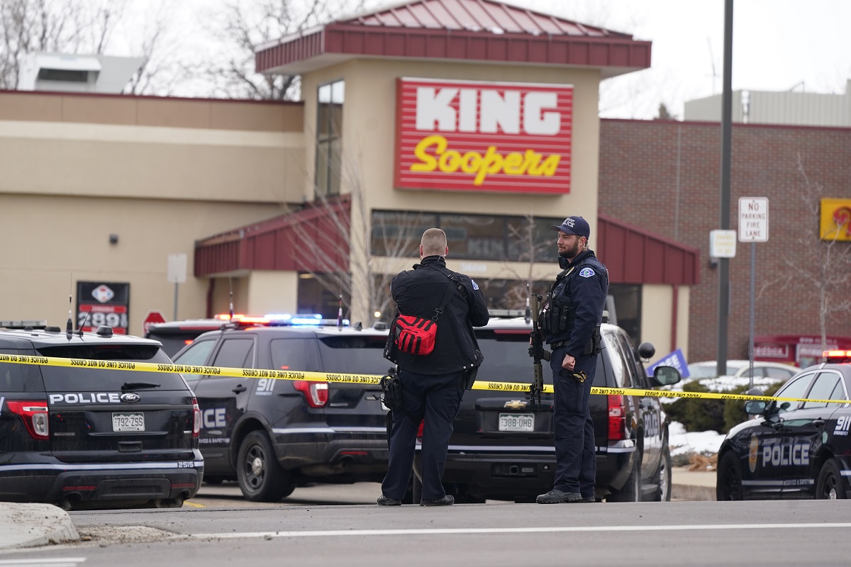 Police work on the scene outside of a King Soopers grocery store