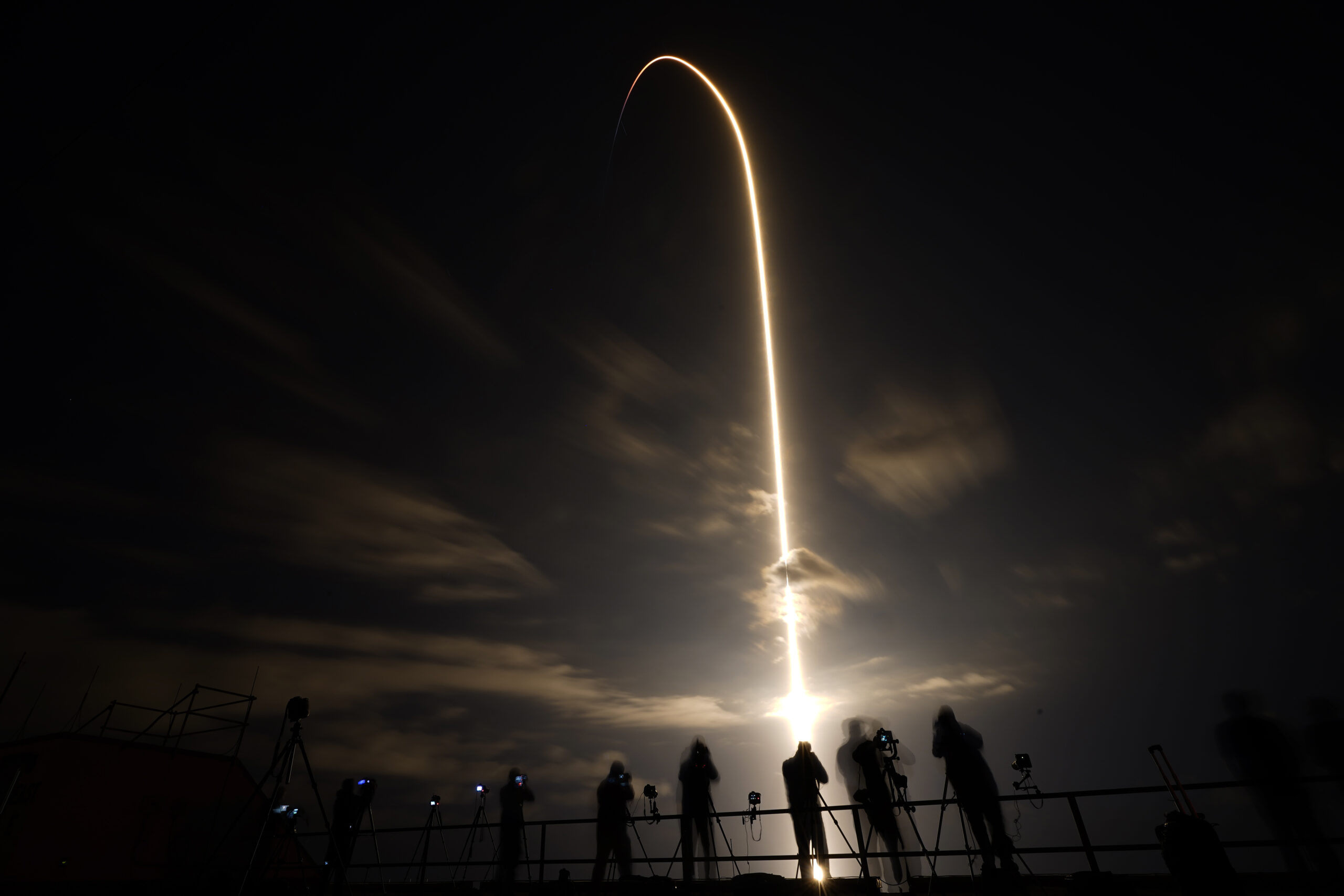 A SpaceX Falcon 9 lifts off in this time exposure from Launch Complex 39A Friday, April 23, 2021, at the Kennedy Space Center in Cape Canaveral, Fla. Four astronauts will fly on the SpaceX Crew-2 mission to the International Space Station. (AP Photo/Chris O'Meara)