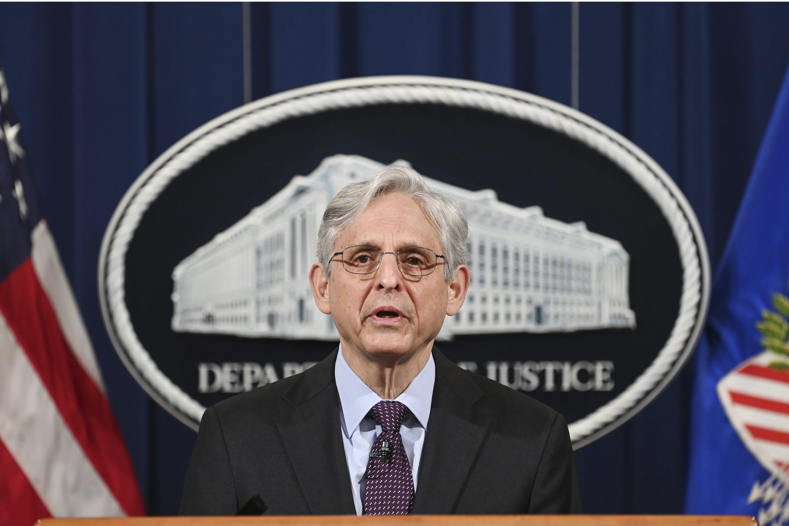 Attorney General Merrick Garland speaks at the Department of Justice in Washington, Monday, April 26, 2021. The Justice Department is opening a sweeping probe into policing in Louisville after the March 2020 death of Breonna Taylor, who was shot to death by police during a raid at her home. (Mandel Ngan/Pool via AP)