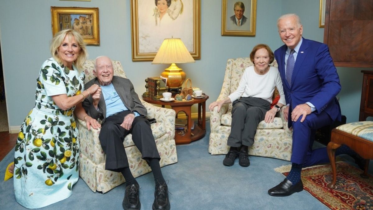 Why Do the Bidens Look Giant in Photo With Carters?