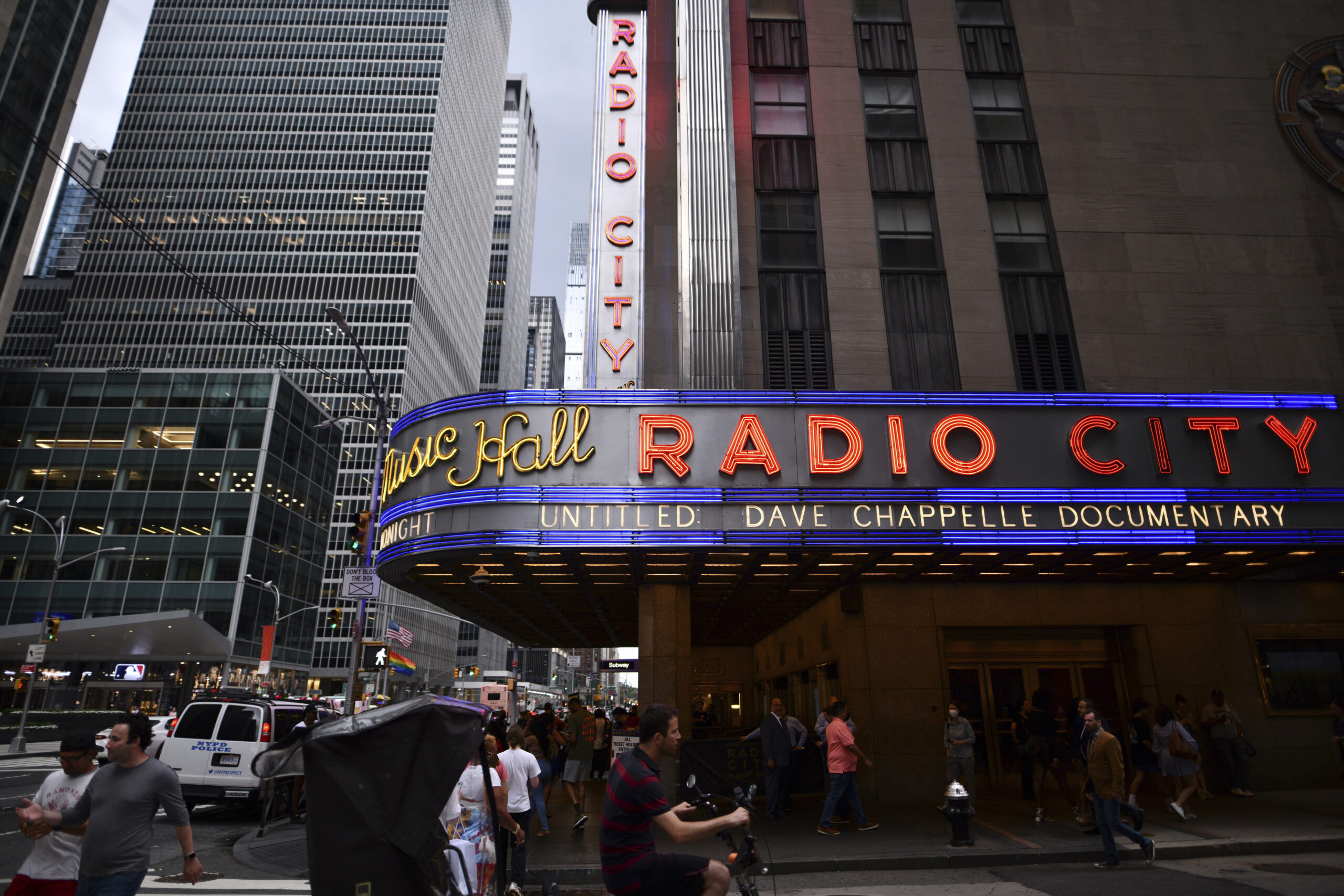 Radio City Music Hall's marquee advertises Dave Chappelle's untitled documentary during the closing night celebration for the 20th Tribeca Festival on Saturday, June 19, 2021, in New York. (Photo by Charles Sykes/Invision/AP)