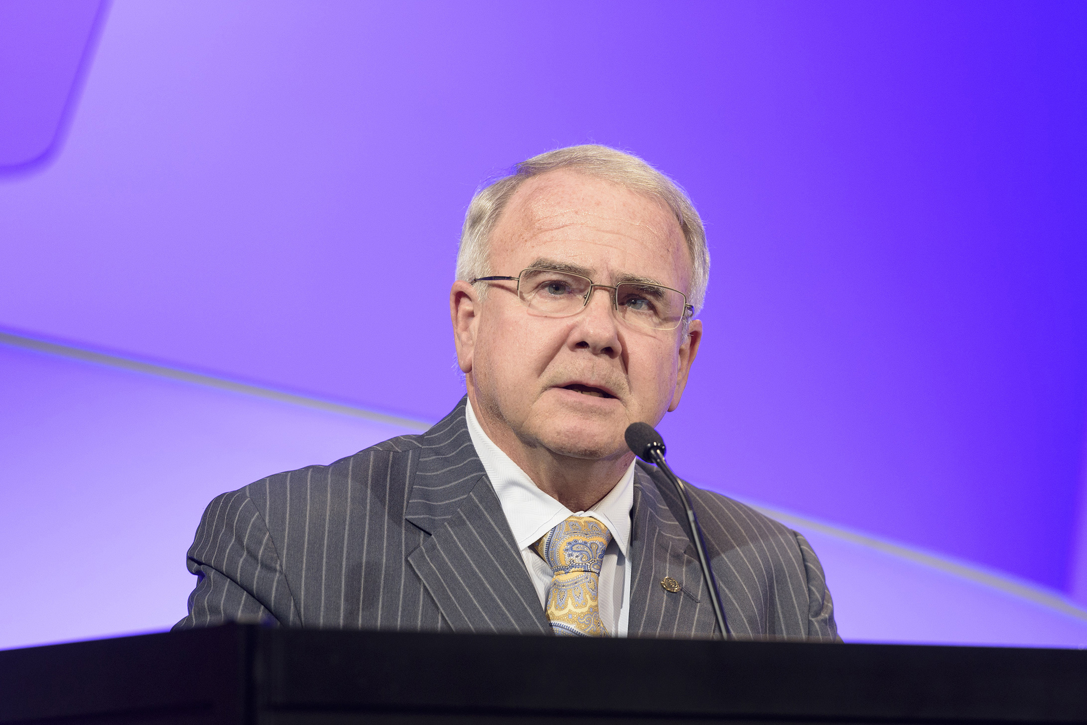 This November 2018 photo provided by the American Medical Association shows Gerald Harmon at the Interim Meeting of the AMA in National Harbor, Md. The nation’s largest, most influential doctors’ group is holding its annual policymaking meeting starting Friday, June 11, 2021, amid backlash over its most ambitious plan ever — to help dismantle centuries-old racism and bias in all realms of the medical establishment. Harmon, the group's incoming president, knows he isn’t the most obvious choice to lead the AMA at this pivotal time. But he seems intent on breaking down stereotypes and said pointedly in a phone interview, “This plan is not up for debate.’’ (Ted Grudzinski/American Medical Association via AP)