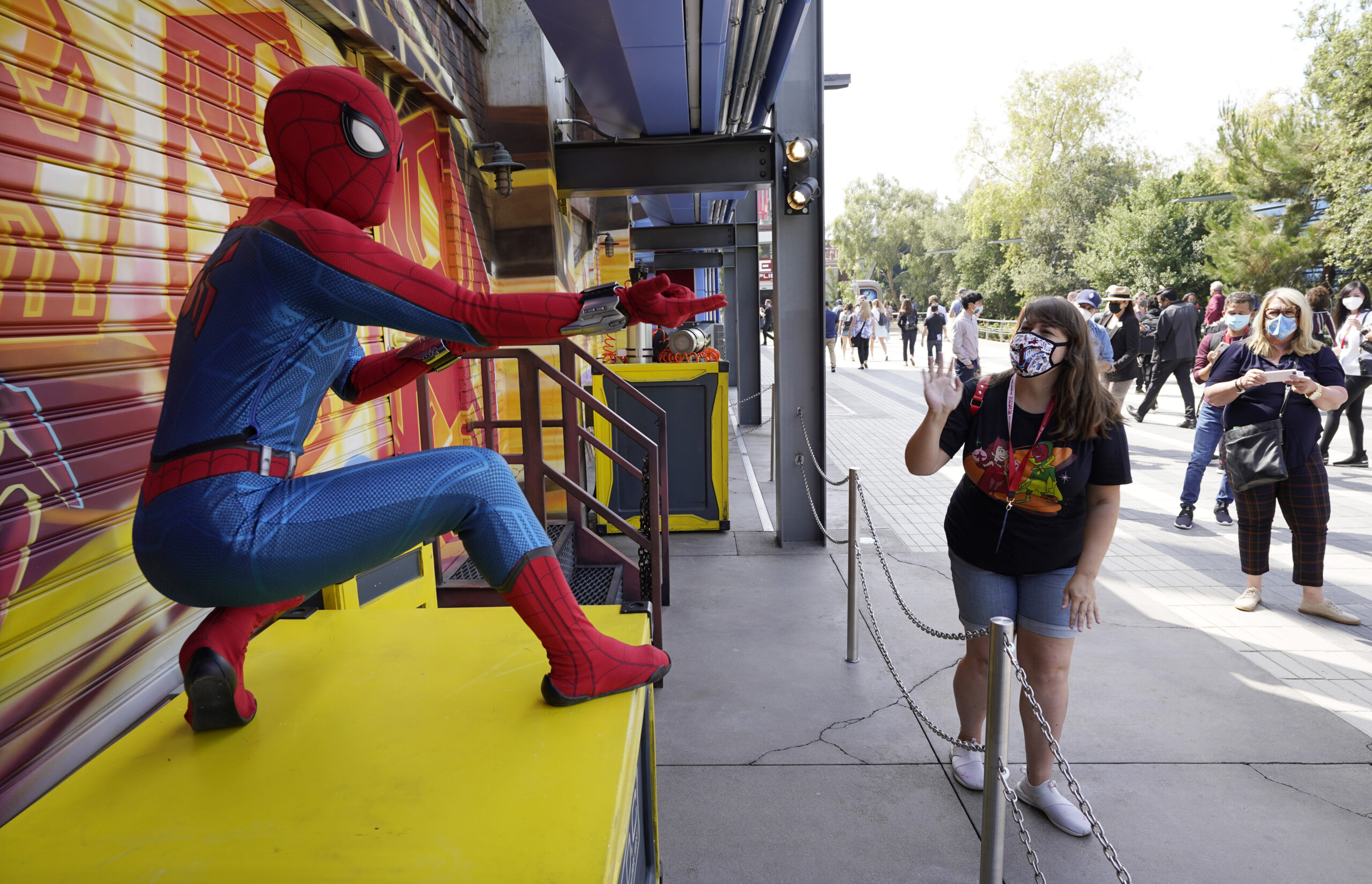 A Spider-Man character poses for guests following "The Amazing Spider-Man!" show at the Avengers Campus media preview at Disney's California Adventure Park on Wednesday, June 2, 2021, in Anaheim, Calif. (AP Photo/Chris Pizzello)