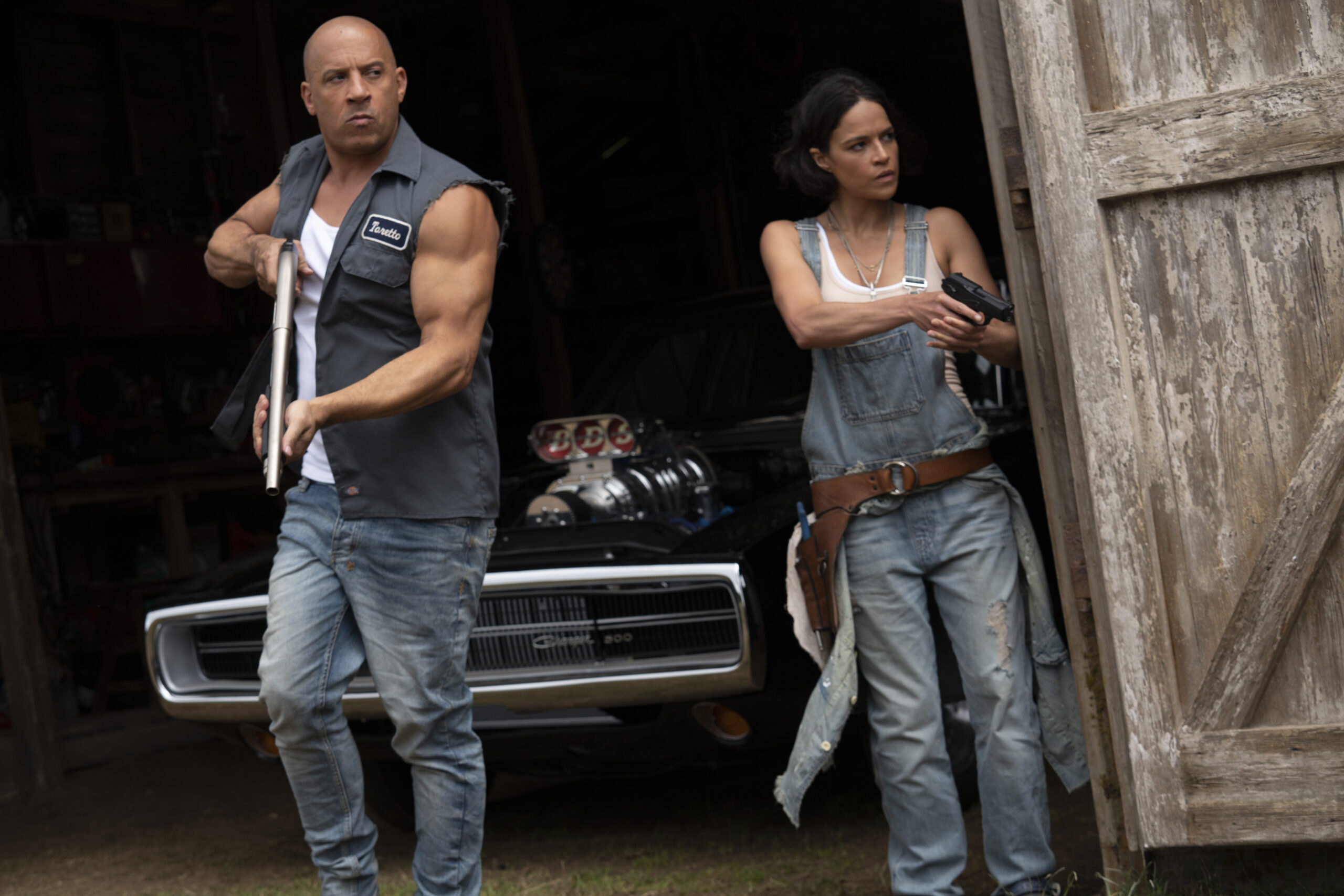 This image released by Universal Pictures shows Vin Diesel, left, and Michelle Rodriguez in a scene from "F9: The Fast Saga." (Giles Keyte/Universal Pictures via AP)