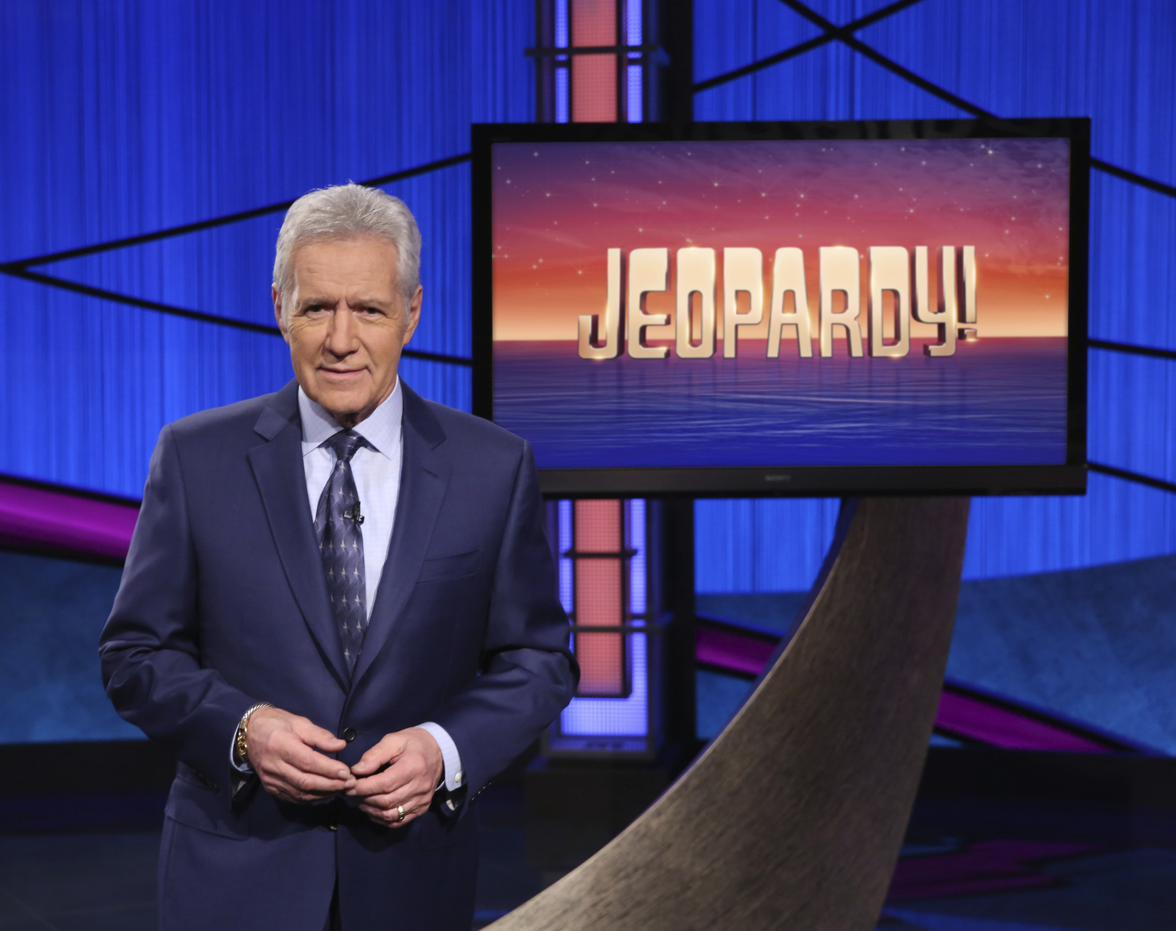 FILE - This image released by Jeopardy! shows Alex Trebek, host of the game show "Jeopardy!" Filling the void left by Trebek after 37 years involves sophisticated research and a parade of guest hosts doing their best to impress viewers and the studio that will make the call. (Jeopardy! via AP)