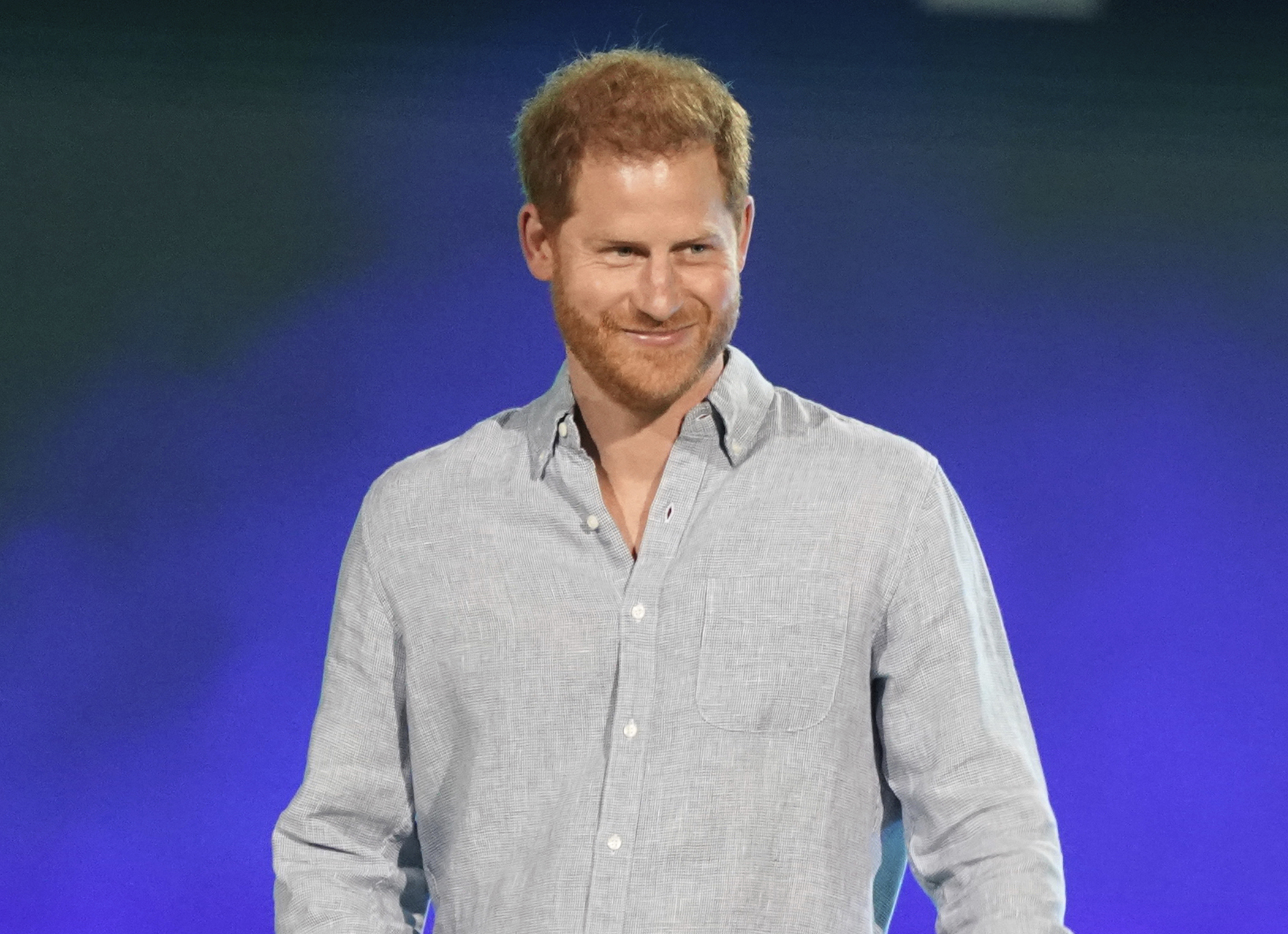 FILE - In this May 2, 2021, file photo, Prince Harry, Duke of Sussex, speaks at "Vax Live: The Concert to Reunite the World" in Inglewood, Calif. Prince Harry took a break from paternity leave to “spread the news” about his Invictus Games. The Duke of Sussex announced in an Instagram post Wednesday, June 9, 2021, that the Invictus Games will take place in Düsseldorf, Germany, in 2023. (Photo by Jordan Strauss/Invision/AP, File)