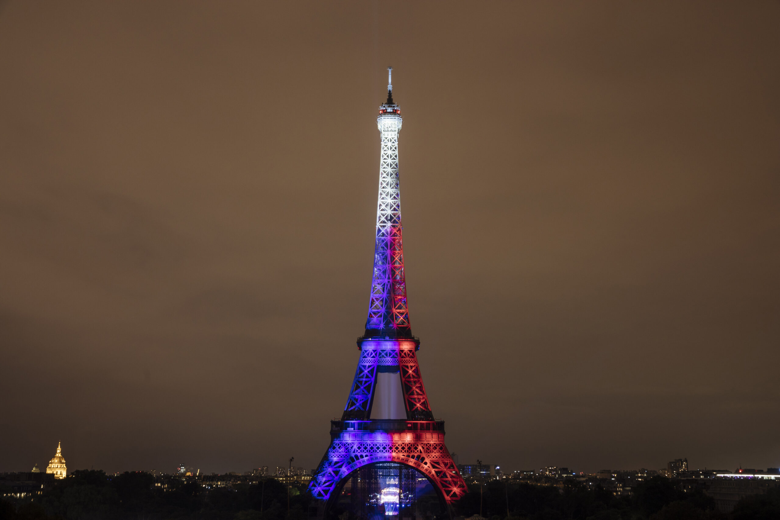 Fireworks illuminate the Eiffel Tower in Paris during Bastille Day celebrations late Wednesday, July 14, 2021. France celebrated its national holiday Wednesday with thousands of troops marching in a Paris parade, after last year's events were scaled back because of COVID-19 virus fears. (AP Photo/Lewis Joly)
