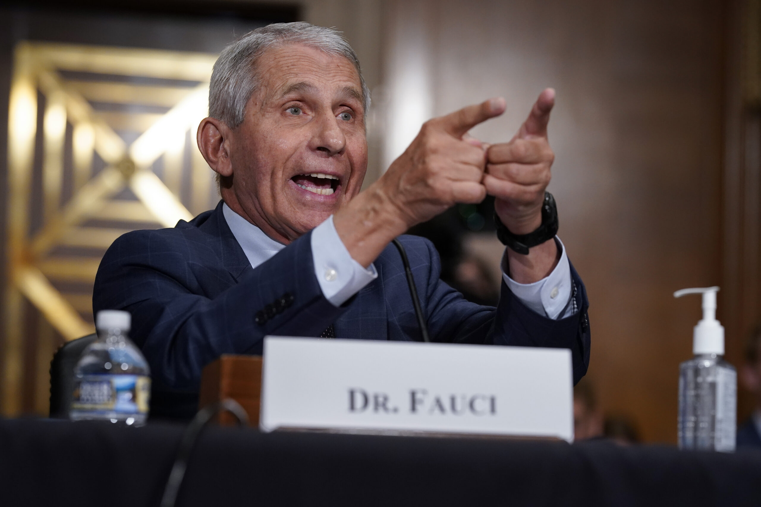 Top infectious disease expert Dr. Anthony Fauci responds to accusations by Sen. Rand Paul, R-Ky., as he testifies before the Senate Health, Education, Labor, and Pensions Committee about the origin of COVID-19, on Capitol Hill in Washington, Tuesday, July 20, 2021. Cases of COVID-19 have tripled over the past three weeks, and hospitalizations and deaths are rising among unvaccinated people. (AP Photo/J. Scott Applewhite, Pool)