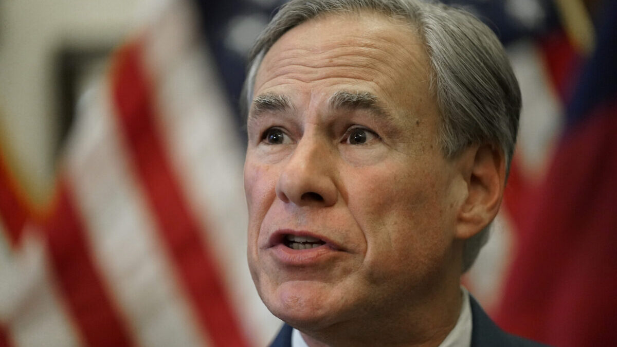FILE - In this June 8, 2021, file photo, Texas Gov. Greg Abbott speaks at a news conference in Austin, Texas. Texas Democrats are starting a second week of holing up in Washington to block new voting laws back home. A reality is fast creeping in: the difficulty of sustaining attention and pressure on Congress with 17 days still left to run out the clock on a sweeping elections bill in Texas, which Abbott says he will keep reviving for as long as it takes. (AP Photo/Eric Gay, File)