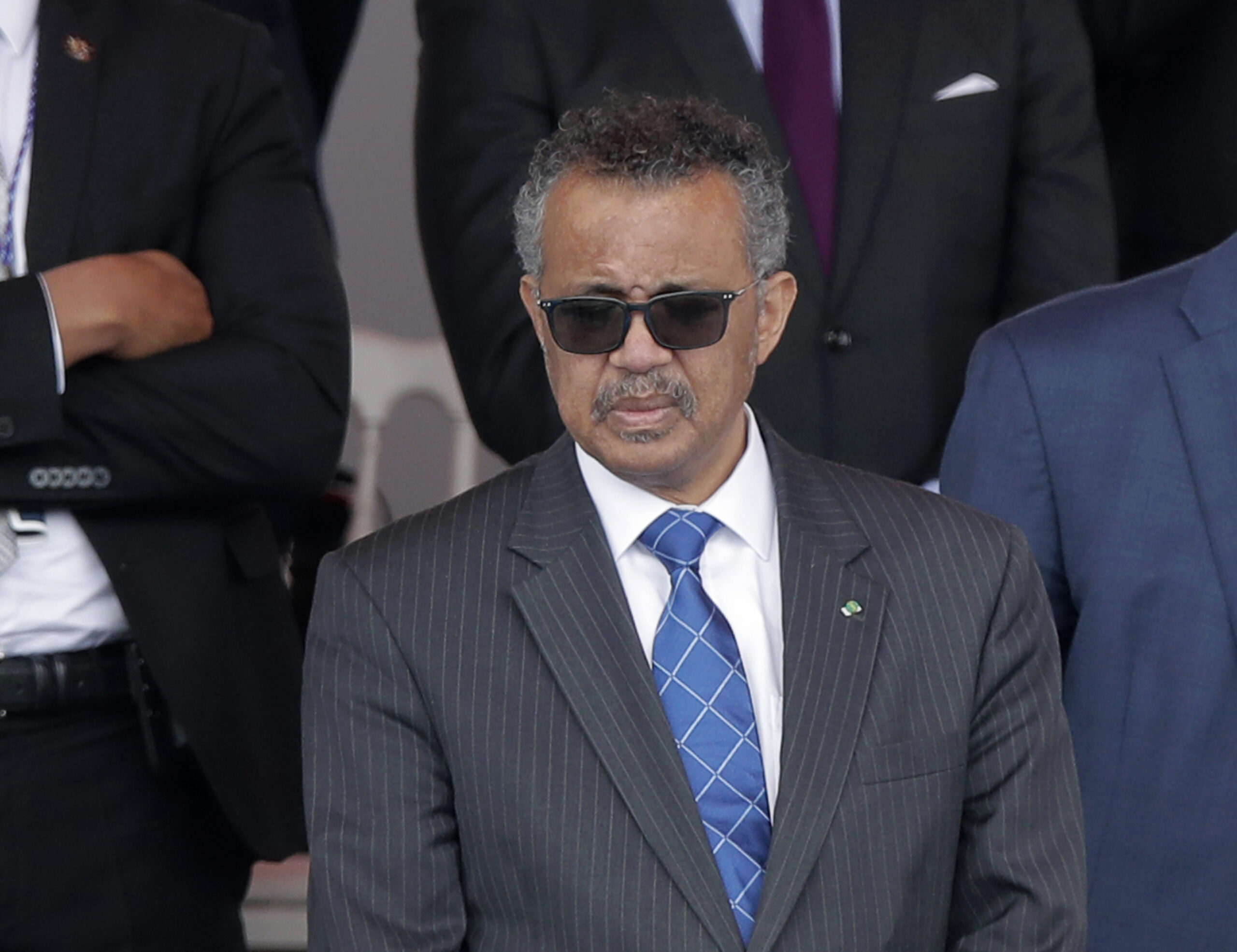 FILE - In this file photo dated Tuesday, July 14, 2020, Director General of the World Health Organization, Tedros Adhanom Ghebreyesus, attends the Bastille Day military parade, in Paris. The head of the World Health Organization has appealed Wednesday Aug. 4, 2021, for a moratorium on administering booster shots of COVID-19 vaccines, to ensure doses are available in countries where few people have yet received their first shots. (AP Photo/Christophe Ena, FILE)