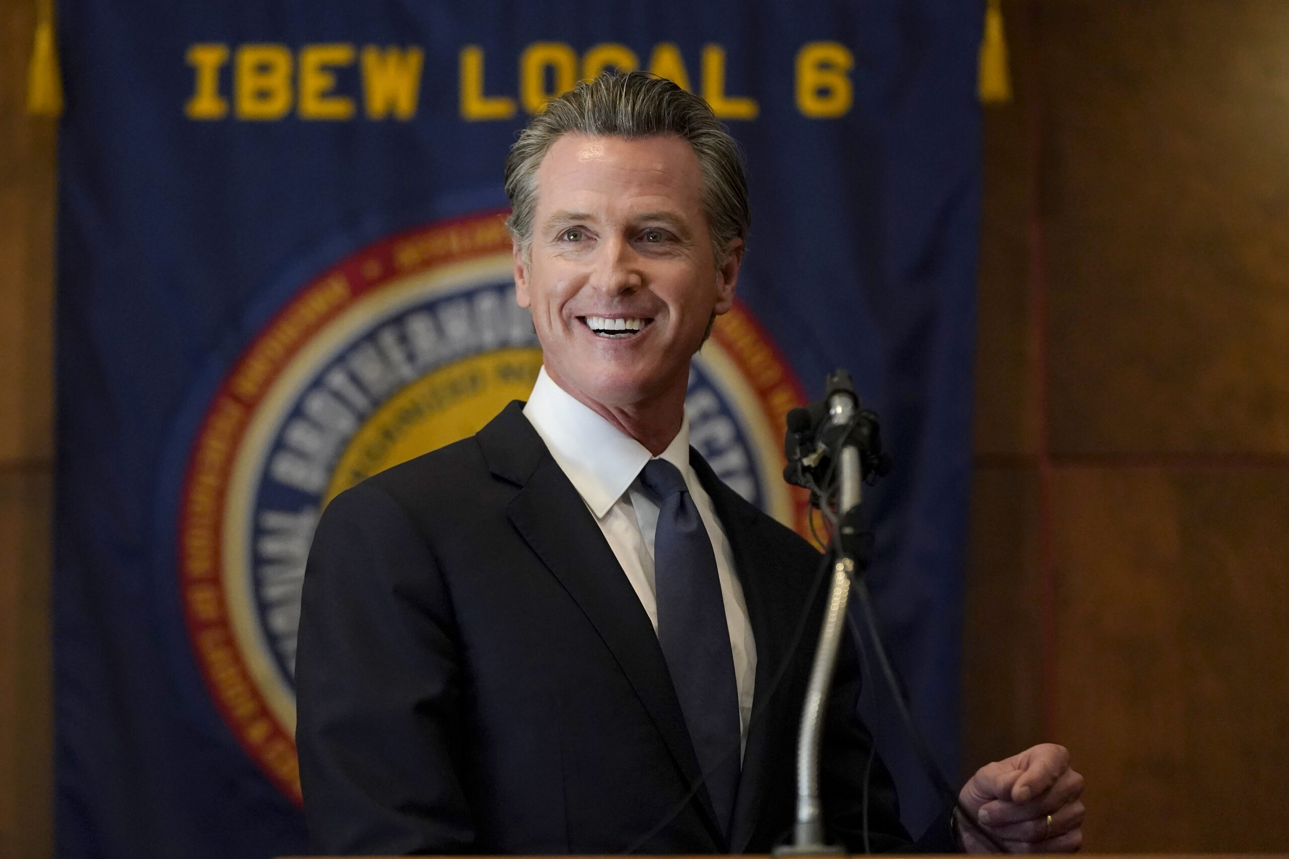 Gov. Gavin Newsom speaks to volunteers in San Francisco, Tuesday, Sept. 14, 2021. The recall election that could remove California Democratic Gov. Newsom is coming to an end. Voting concludes Tuesday in the rare, late-summer election that has emerged as a national battlefront on issues from COVID-19 restrictions to climate change. (AP Photo/Jeff Chiu)