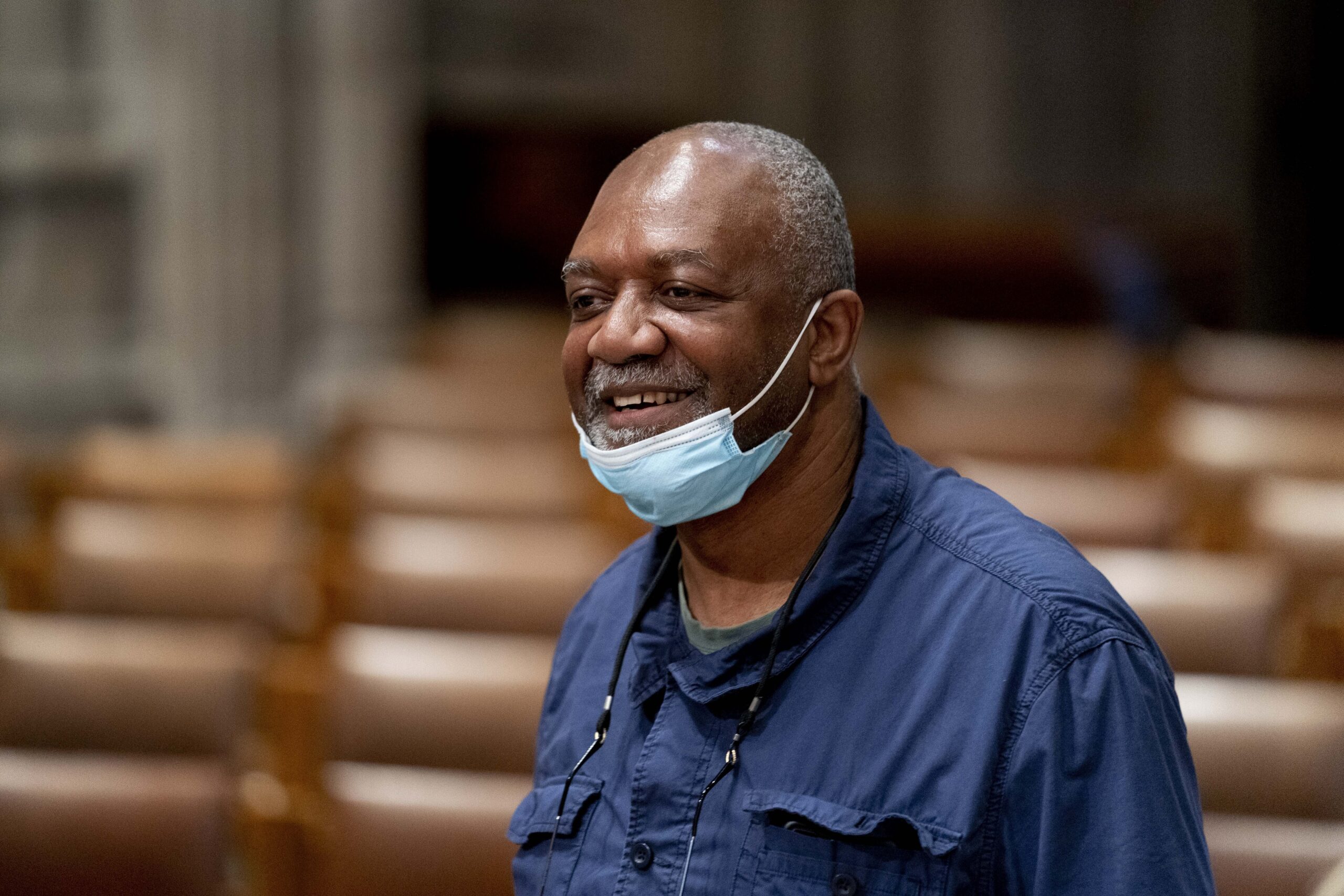 Artist Kerry James Marshall, who has been selected to design a replacement of former Confederate-themed stained glass windows that were taken down in 2017 at the National Cathedral, stands in Washington, Thursday, Sept. 23, 2021. The Cathedral has also commissioned Pulitzer-nominated poet Elizabeth Alexander to pen a poem that will be inscribed in the stone beneath the new windows. (AP Photo/Andrew Harnik)