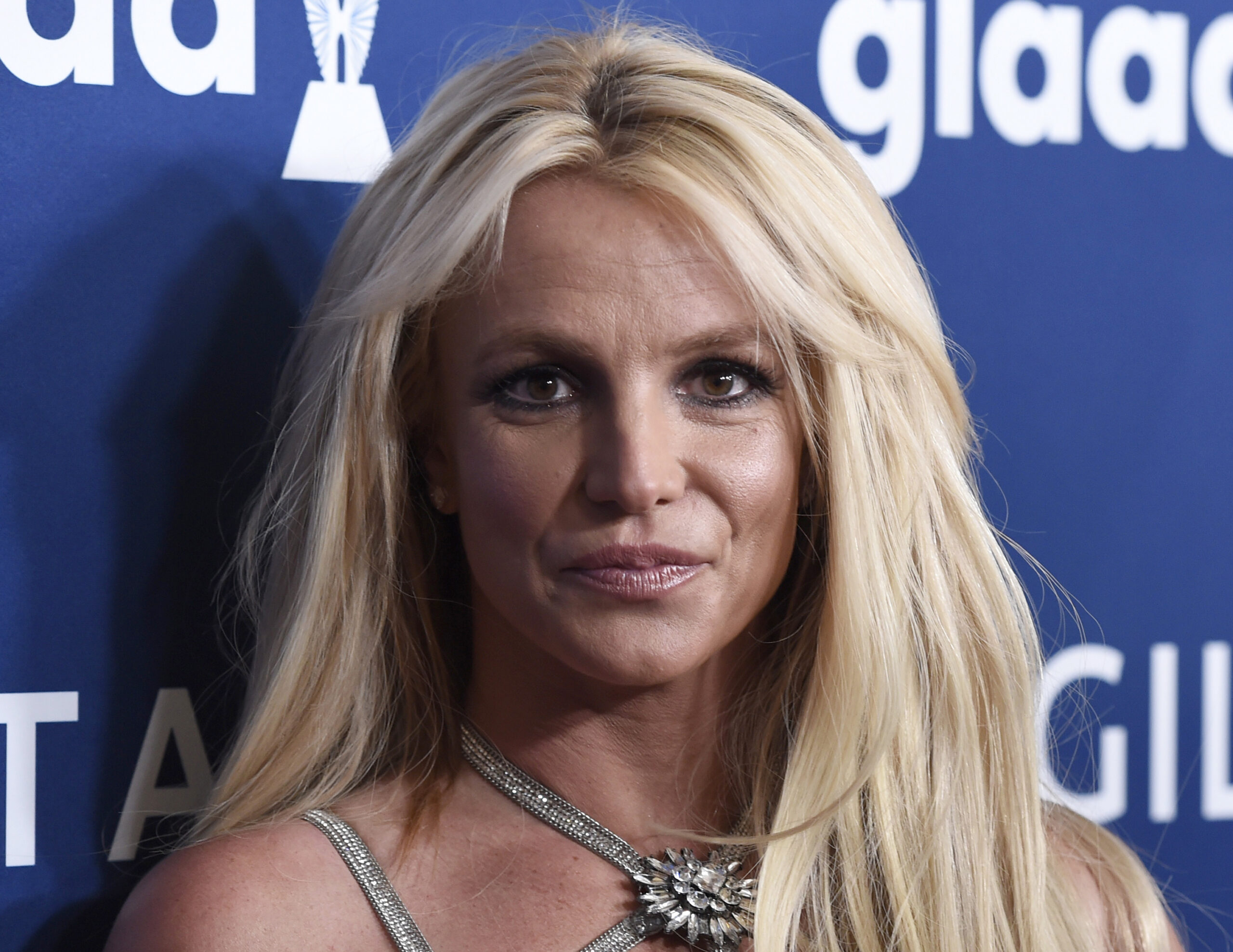 FILE - Britney Spears arrives at the 29th annual GLAAD Media Awards on April 12, 2018, in Beverly Hills, Calif. Authorities say they are investigating Spears for misdemeanor battery after a staff member at her home said the singer struck her. The Ventura County Sheriff's Office said Thursday, Aug. 19, 2021, that deputies responded to Spears home after the staff member reported the Monday night dispute. (Photo by Chris Pizzello/Invision/AP, File)