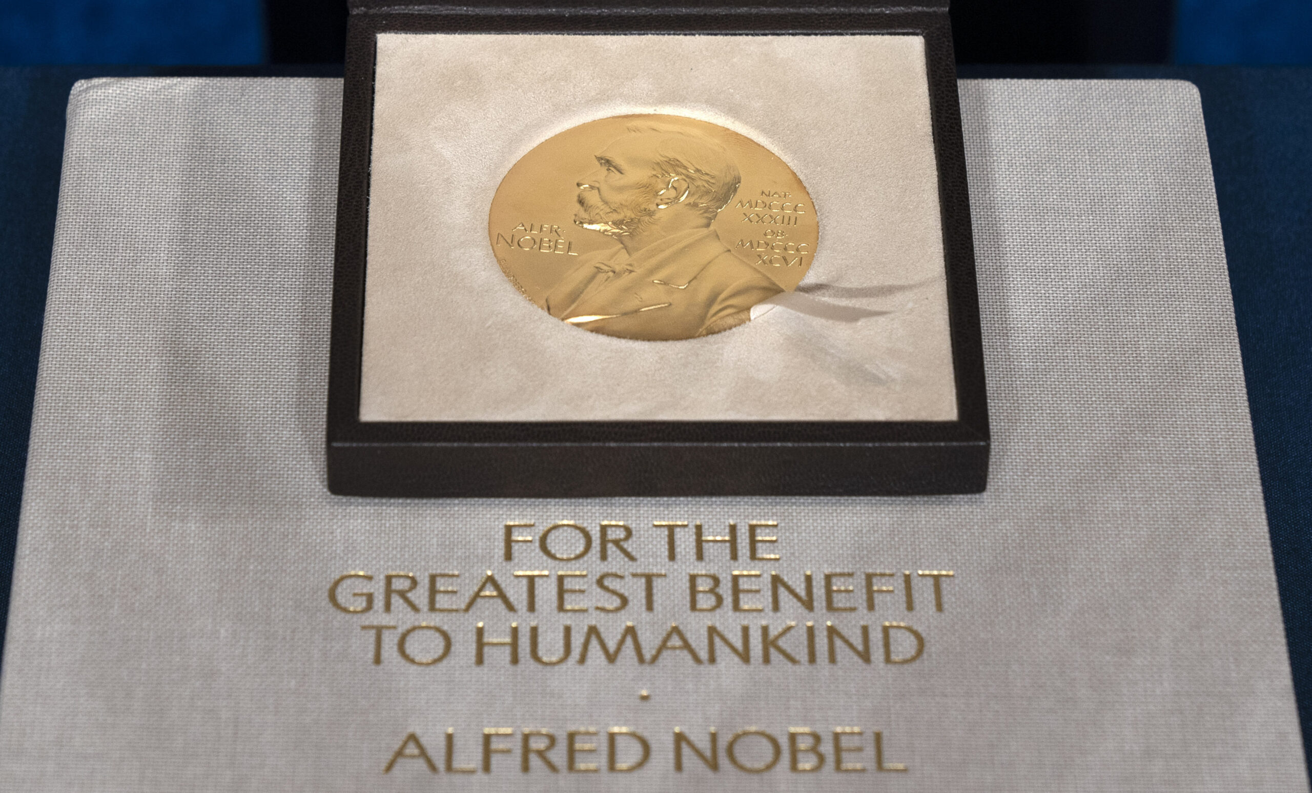 FILE - A Tuesday, Dec. 8, 2020 file photo of a Nobel Prize medal. The Nobel Prize in Literature is due to be awarded on Thursday Oct. 7, 2021. (AP Photo/Jacquelyn Martin, File)