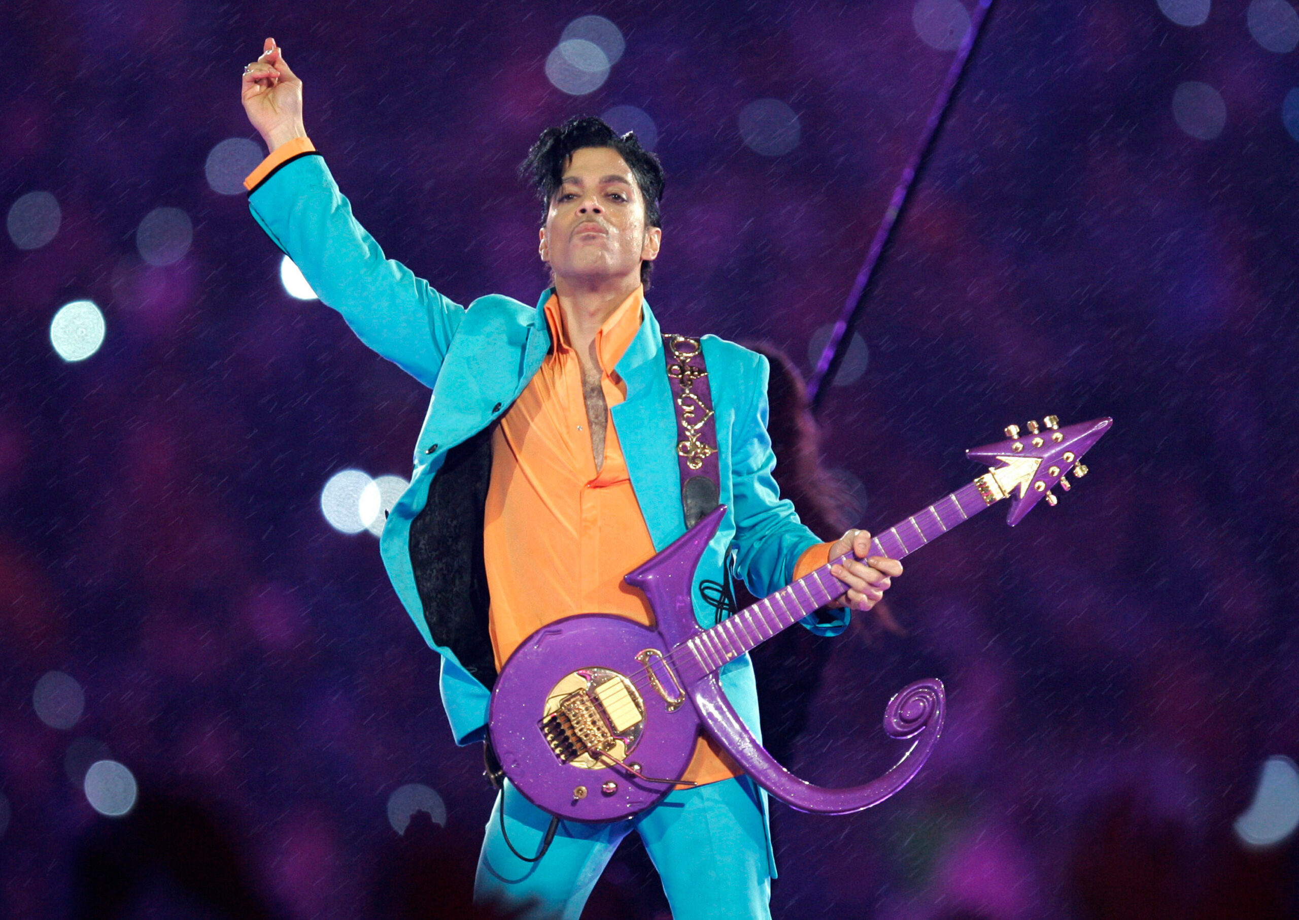FILE - In this Feb. 4, 2007, file photo, Prince performs during the halftime show at the Super Bowl XLI football game in Miami. Minnesota's Congressional delegation on Monday, Oct. 25, 2021, is introducing a resolution to posthumously award the Congressional Gold Medal to pop superstar Prince, citing his "indelible mark on Minnesota and American culture,” The Associated Press has learned. (AP Photo/Chris O'Meara, File)