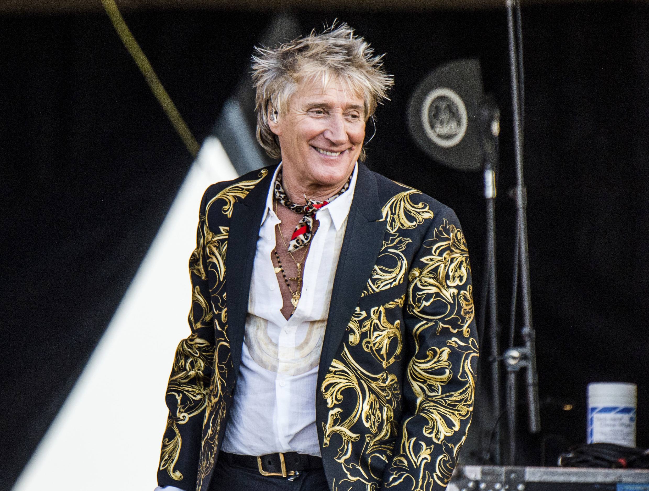 FILE - Rod Stewart performs at the New Orleans Jazz and Heritage Festival on April 28, 2018. A plea deal between Stewart and Florida prosecutors to settle charges he and his adult son Sean battered a security guard at a New Year's Eve party two years ago has fallen through. The pair are now scheduled to stand trial on misdemeanor battery charges in January. (Photo by Amy Harris/Invision/AP, File)