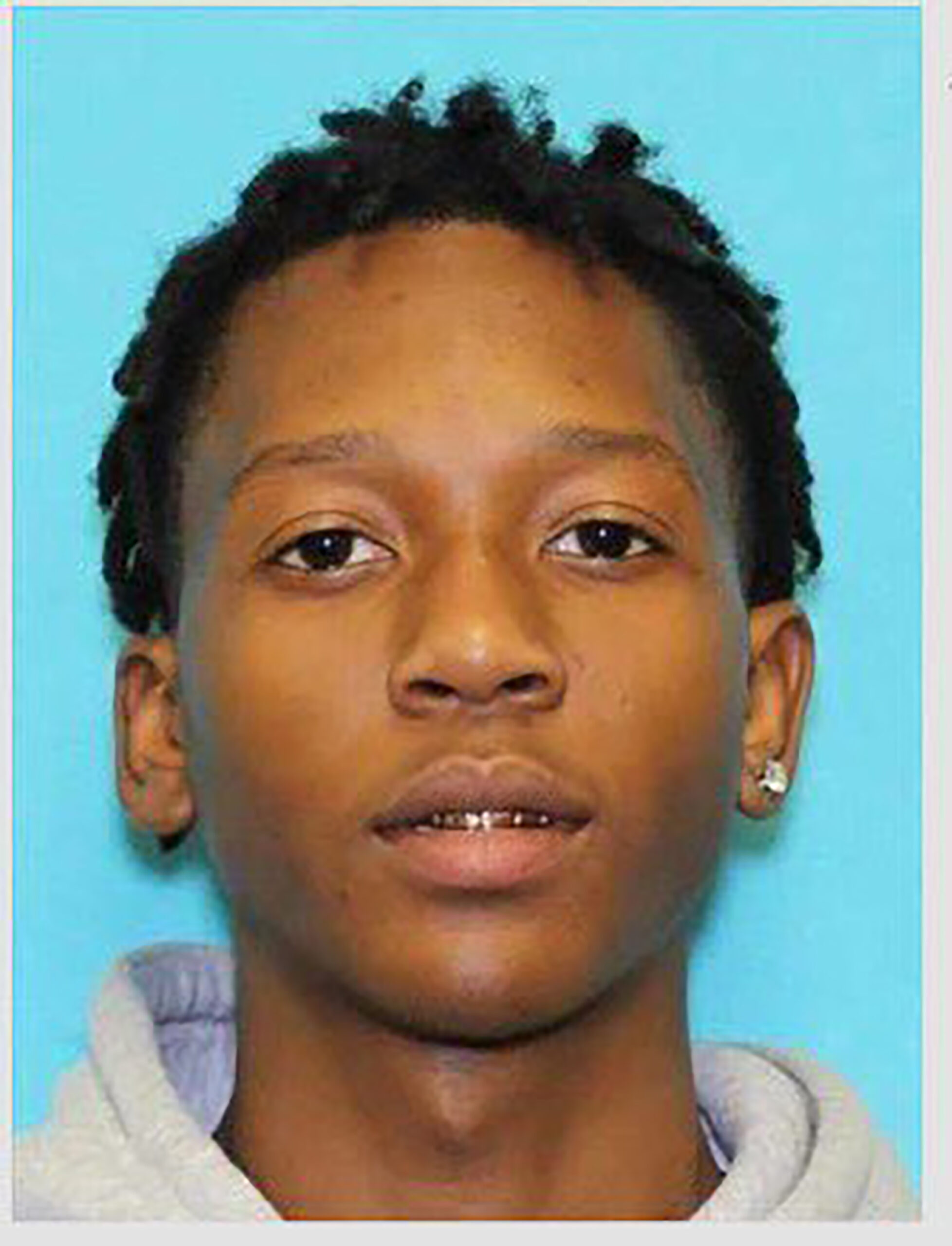 This undated photo provided by the Arlington Police Department in Arlington, Texas shows Timothy George Simpkins. Police are searching for Simpkins, who is the suspected shooter at a Dallas-area high school, leaving four people injured before fleeing, authorities said Wednesday, Oct. 6, 2021. (Arlington Police Department via AP)