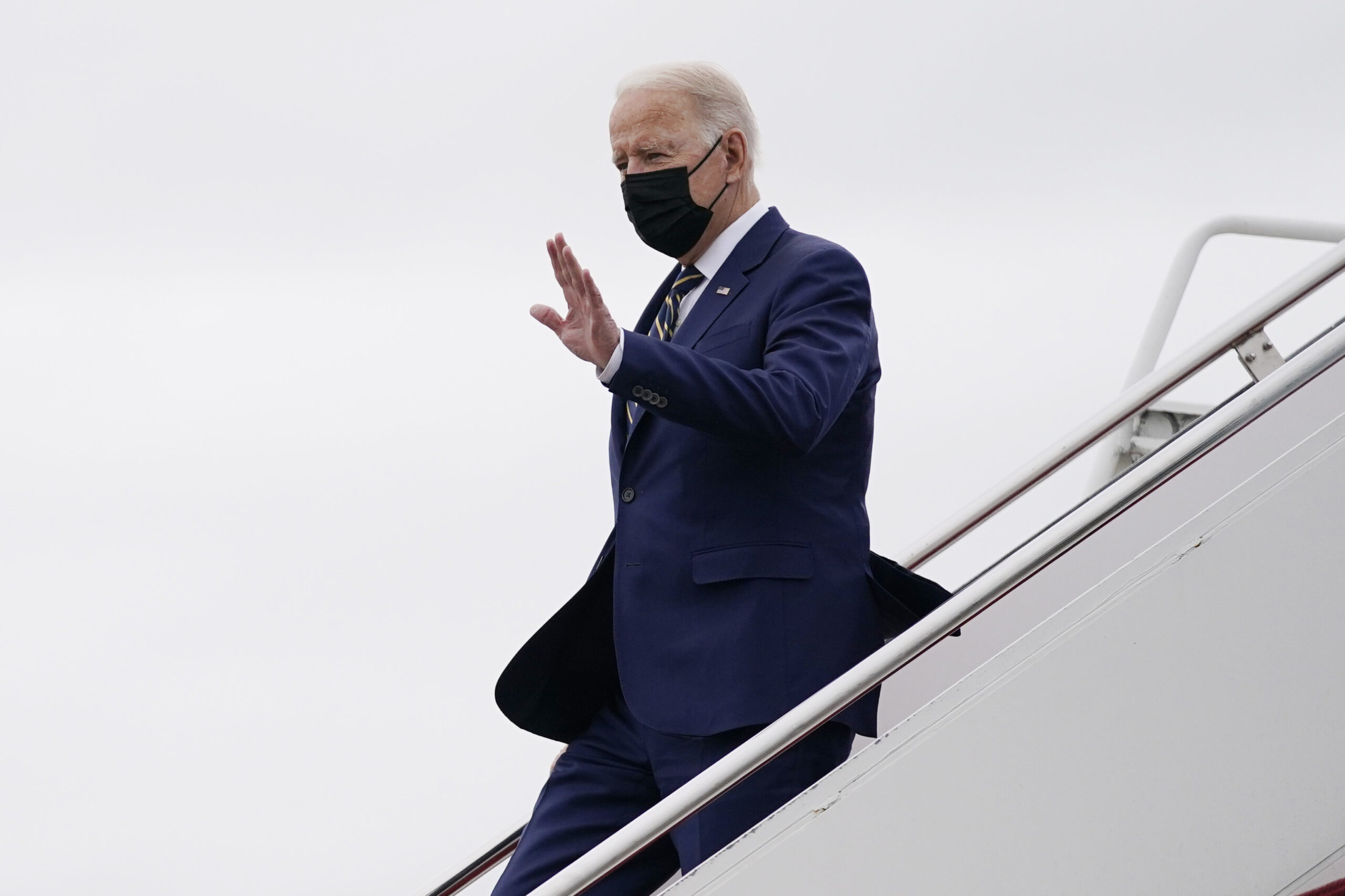 President Joe Biden arrives at Edinburgh Airport to attend the COP26 U.N. Climate Summit, Monday, Nov. 1, 2021, in Edinburgh, Scotland. (AP Photo/Evan Vucci)