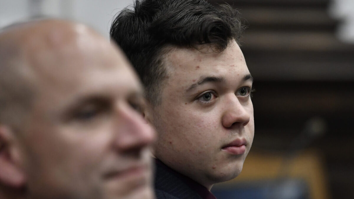 Kyle Rittenhouse, right, and his attorney Corey Chirafisi listen during his trial at the Kenosha County Courthouse in Kenosha, Wis., on Thursday, Nov. 11, 2021. Rittenhouse is accused of killing two people and wounding a third during a protest over police brutality in Kenosha, last year. (Sean Krajacic/The Kenosha News via AP, Pool)