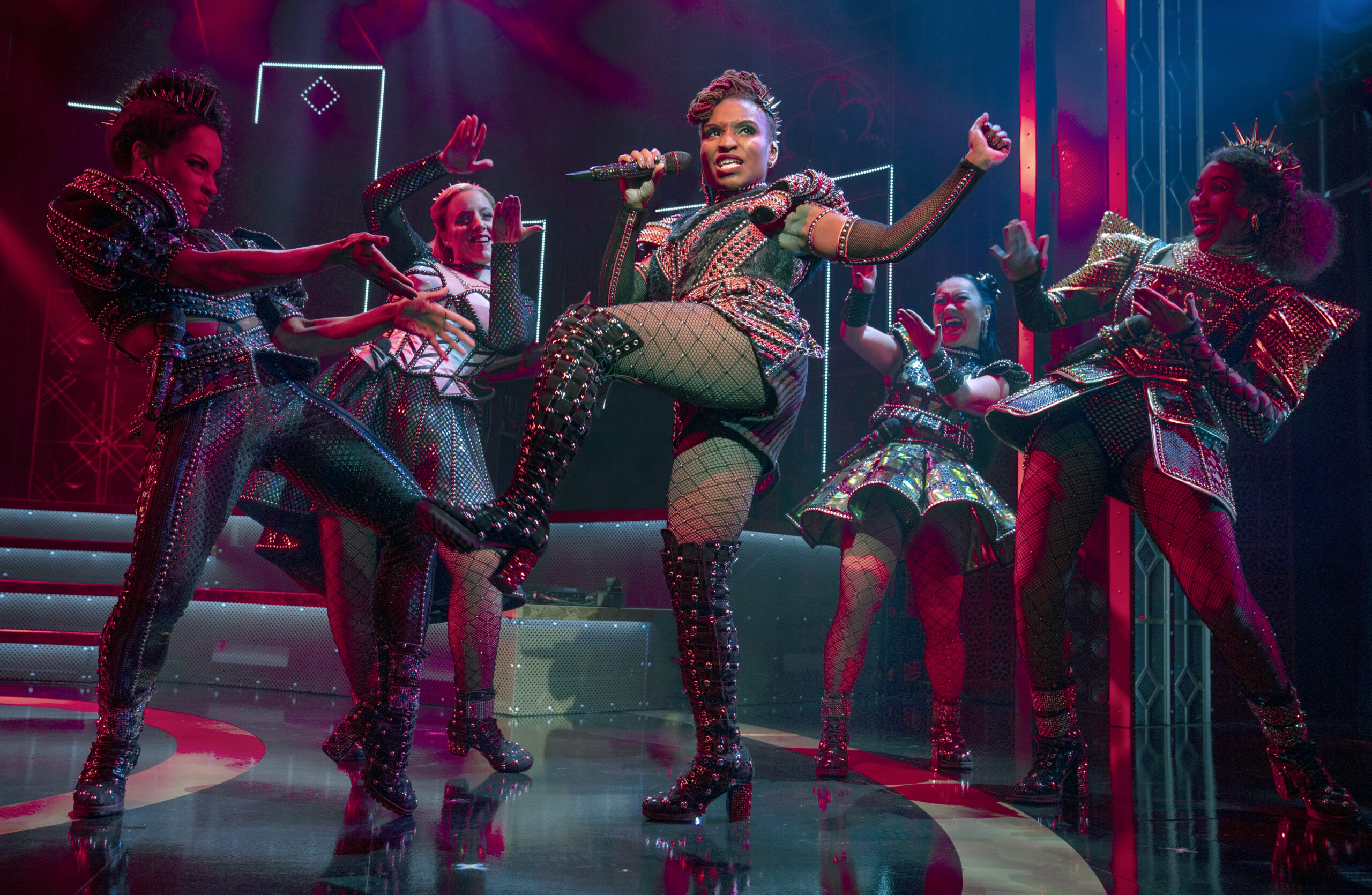 Brittney Mack portrays Anna of Cleves, center, during a performance of the musical "Six," at Broadway’s Brooks Atkinson Theatre in New York. Mack is slated to perform a mashup of some of its songs with her castmates and band in front of a televised audience of millions at the Macy’s Thanksgiving Day Parade. (Joan Marcus/Boneau/Bryan-Brown via AP)