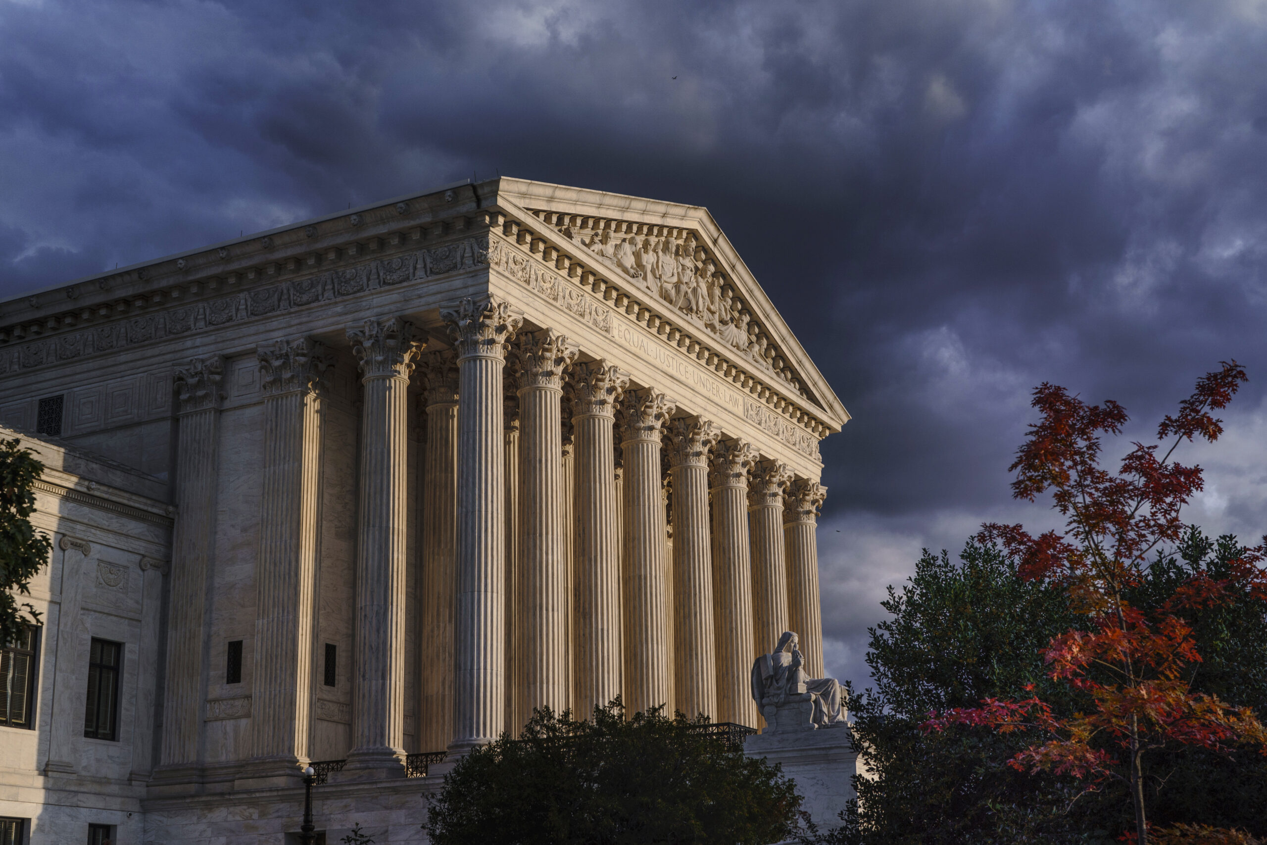 FILE - The Supreme Court is seen at dusk in Washington, Oct. 22, 2021. The Supreme Court is taking up challenges to a Texas law that has virtually ended abortion in the nation’s second largest state after six weeks of pregnancy. The justices are hearing arguments Monday, Nov. 1, in two cases over whether abortion providers or the Justice Department can mount federal court challenges to the law, which has an unusual enforcement scheme its defenders argue shield it from federal court review. (AP Photo/J. Scott Applewhite, File)