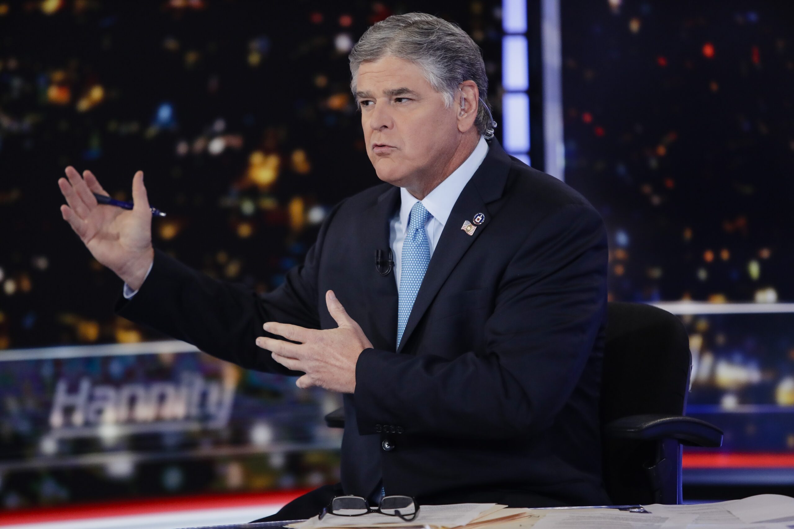 FILE - Fox News host Sean Hannity speaks during a taping of his show, "Hannity," on Aug. 7, 2019, in New York. The revelation that Fox News Channel personalities sent text messages to the White House during the Jan. 6 insurrection urging President Donald Trump to call off the attack is the latest example of the network's stars seeking to influence the actions of newsmakers instead of simply reporting the news.(AP Photo/Frank Franklin II, File)