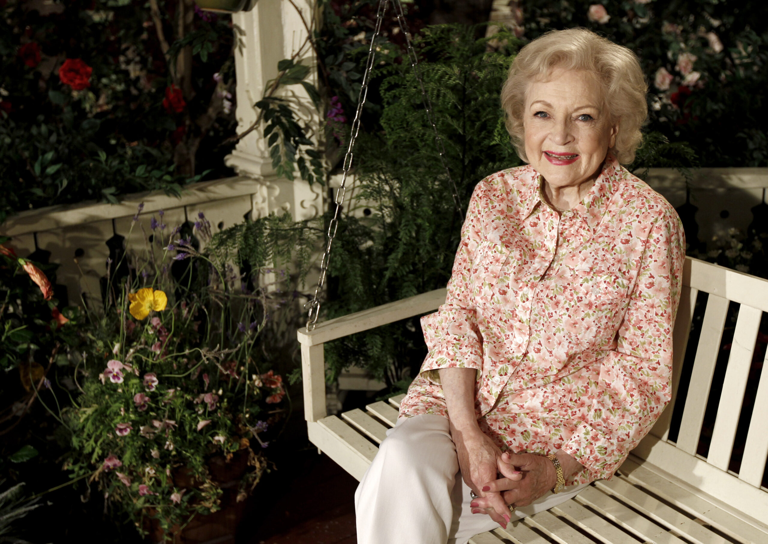 FILE - Actress Betty White poses for a portrait on the set of the television show "Hot in Cleveland" in Studio City section of Los Angeles on Wednesday, June 9, 2010. White died from a stroke she had six days before her Dec. 31, 2021, death at age 99, according to her death certificate. (AP Photo/Matt Sayles, File)