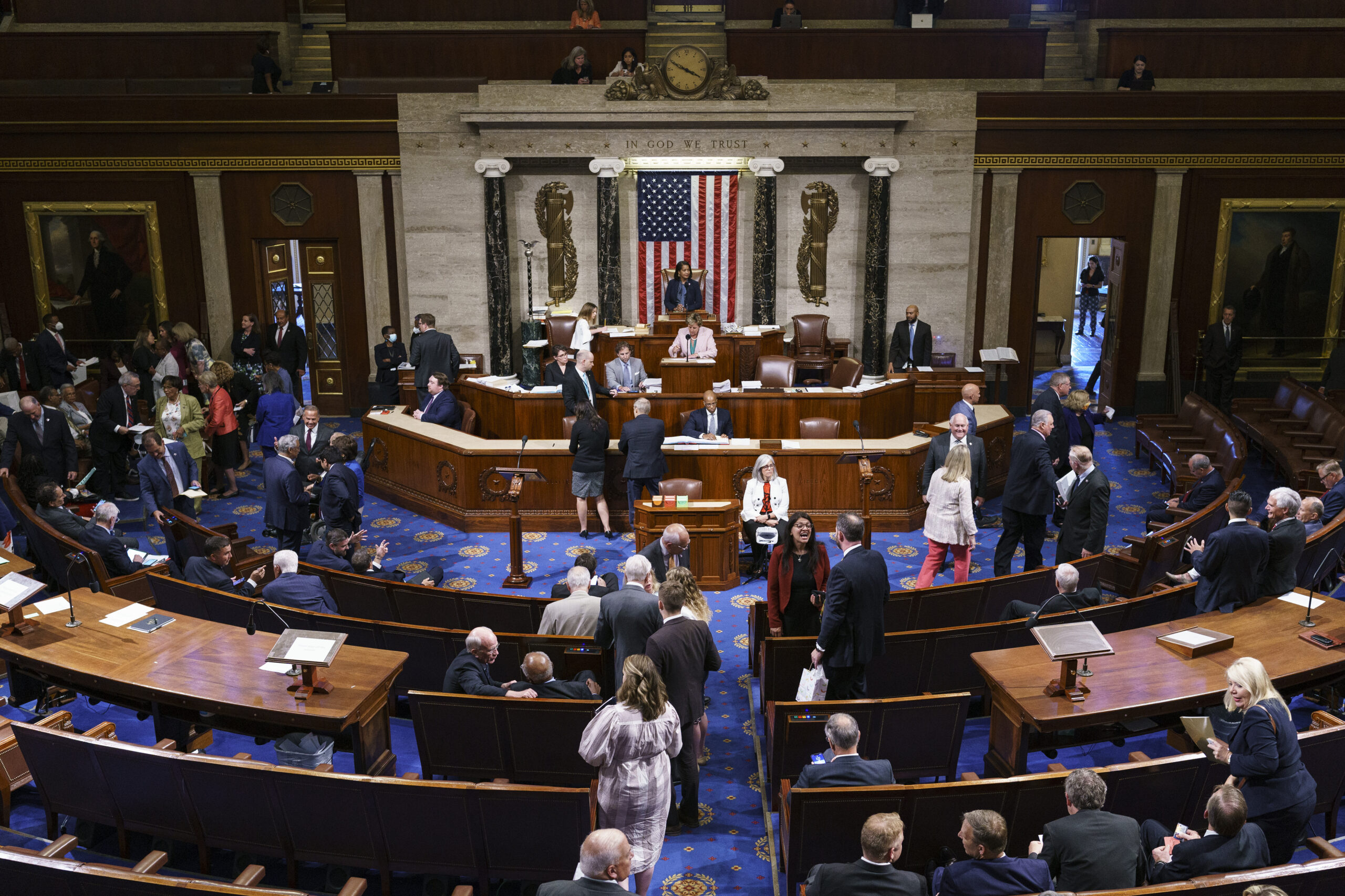 FILE - Members of the House of Representatives gather in the chamber to vote on creation of a select committee to investigate the Jan. 6 Capitol insurrection, at the Capitol in Washington, on June 30, 2021. (AP Photo/J. Scott Applewhite, File)