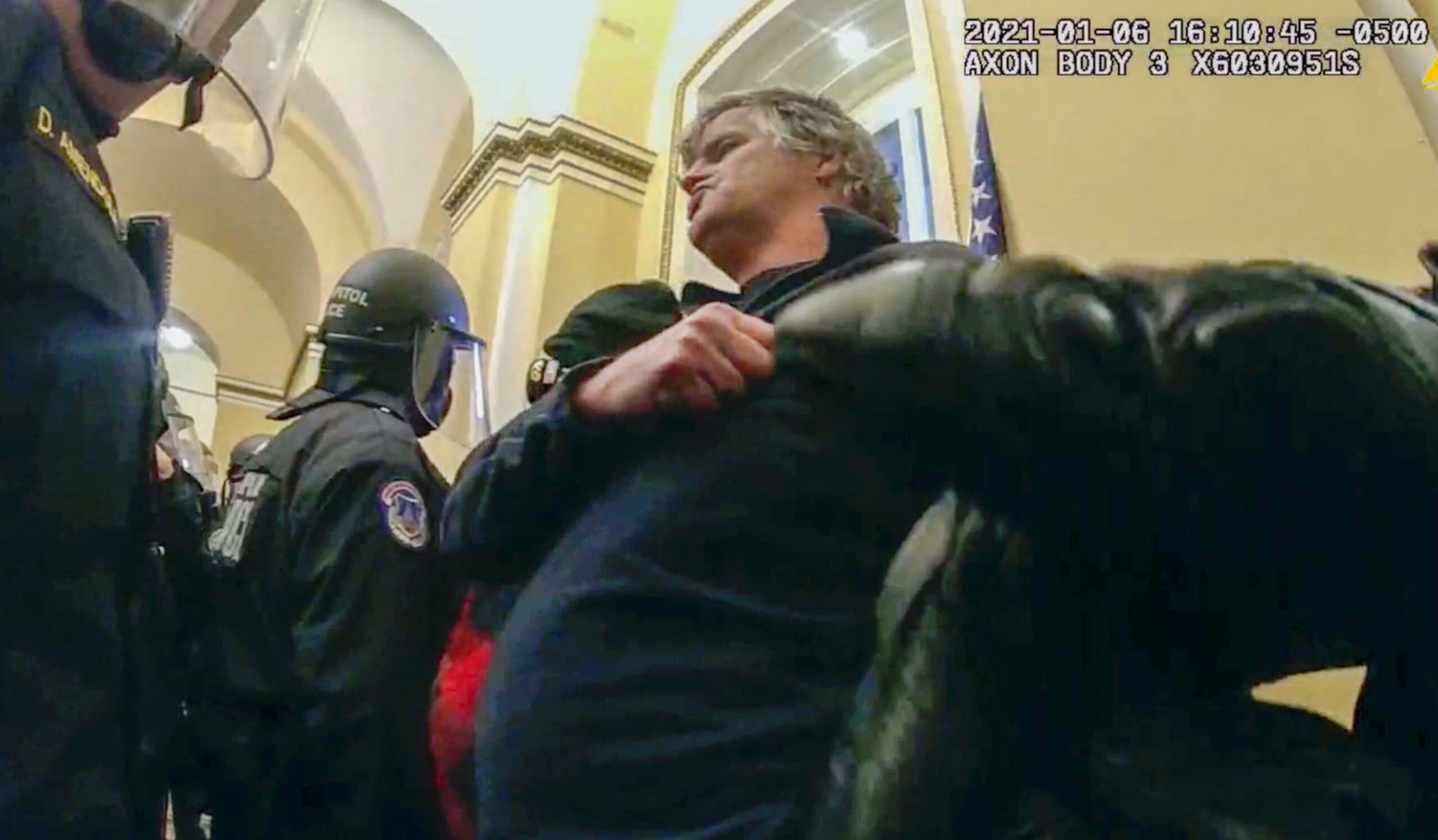 This image from U.S. Capitol Police body-worn video that was in government sentencing memorandum in the case, shows Mark Leffingwell inside the U.S. Capitol near the Senate Wing Doors on Jan. 6, 2021, in Washington. Leffingwell, a 52-year-old military veteran who served in Iraq, who punched two police officers during the riot, was sentenced on Feb. 10, 2022, to six months imprisonment. Leffingwell is the fifth rioter to be sentenced for assaulting police at the Capitol. (U.S. Capitol Police via AP)