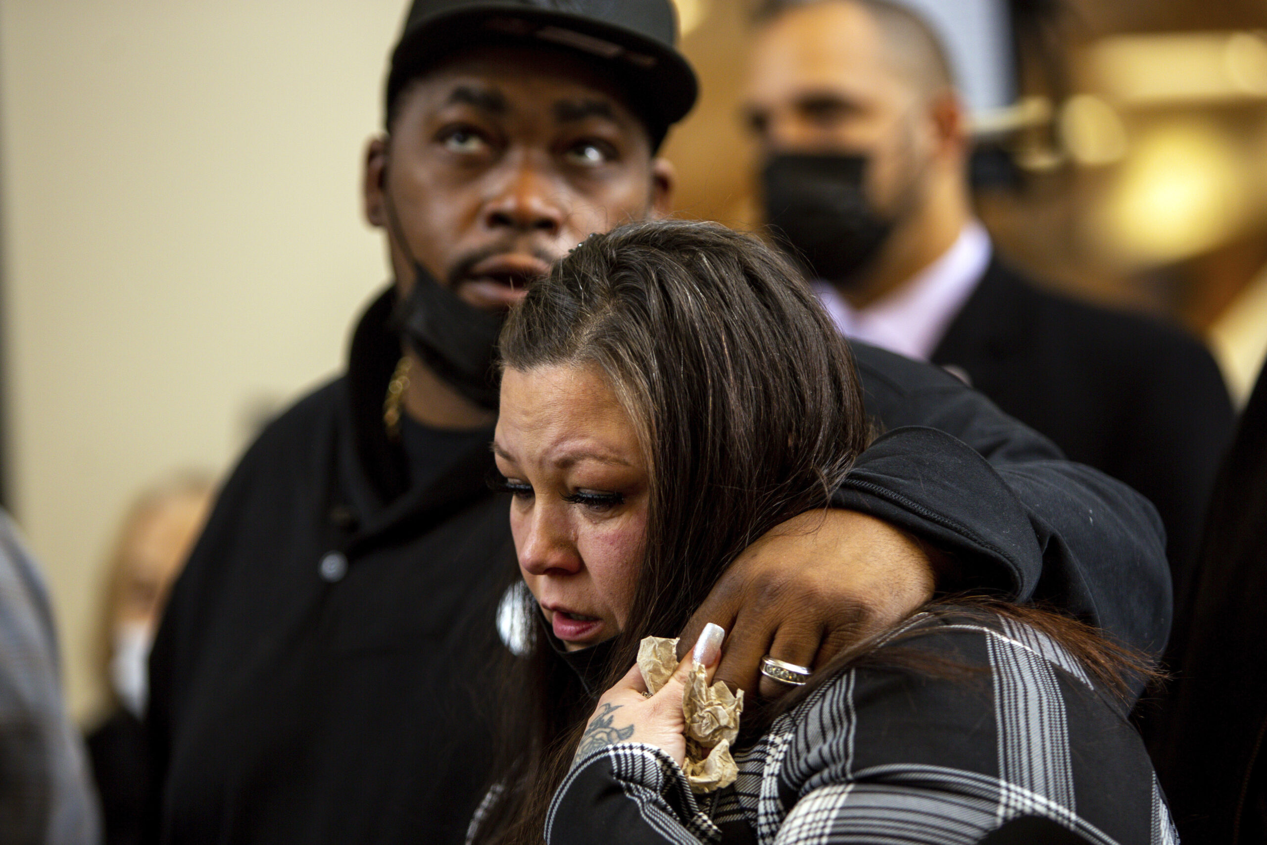 Daunte Wright's parents, Aubrey Wright and Katie Wright, react after former Brooklyn Center Police Officer Kim Potter was sentenced to two years in prison, Friday, Feb. 18, 2022 in Minneapolis. Potter was convicted in December of both first-degree and second-degree manslaughter in the April 11 killing of Wright, a 20-year-old Black motorist. (AP Photo/Nicole Neri )