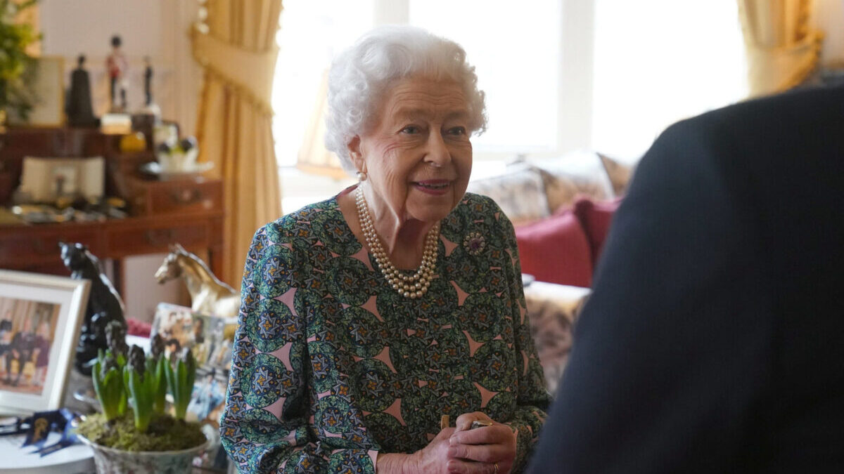 FILE - Queen Elizabeth II speaks during an audience at Windsor Castle where she met the incoming and outgoing Defence Service Secretaries, Wednesday Feb. 16, 2022. Buckingham Palace said Sunday, Feb. 20, 2022 that Queen Elizabeth II tested positive for COVID-19, has mild symptoms and will continue with duties. (Steve Parsons, Pool via AP, File)