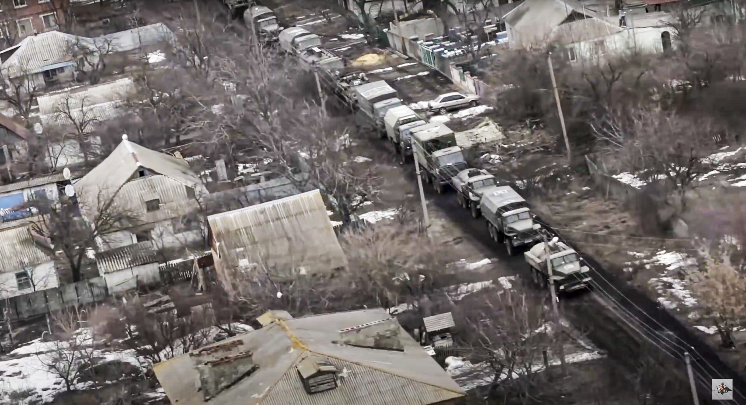 In this photo taken from video released by the Russian Defense Ministry Press Service on Thursday, March 3, 2022, a view from the window of a Russian military helicopter as it flies over an undisclosed location in Ukraine. (Russian Defense Ministry Press Service via AP)